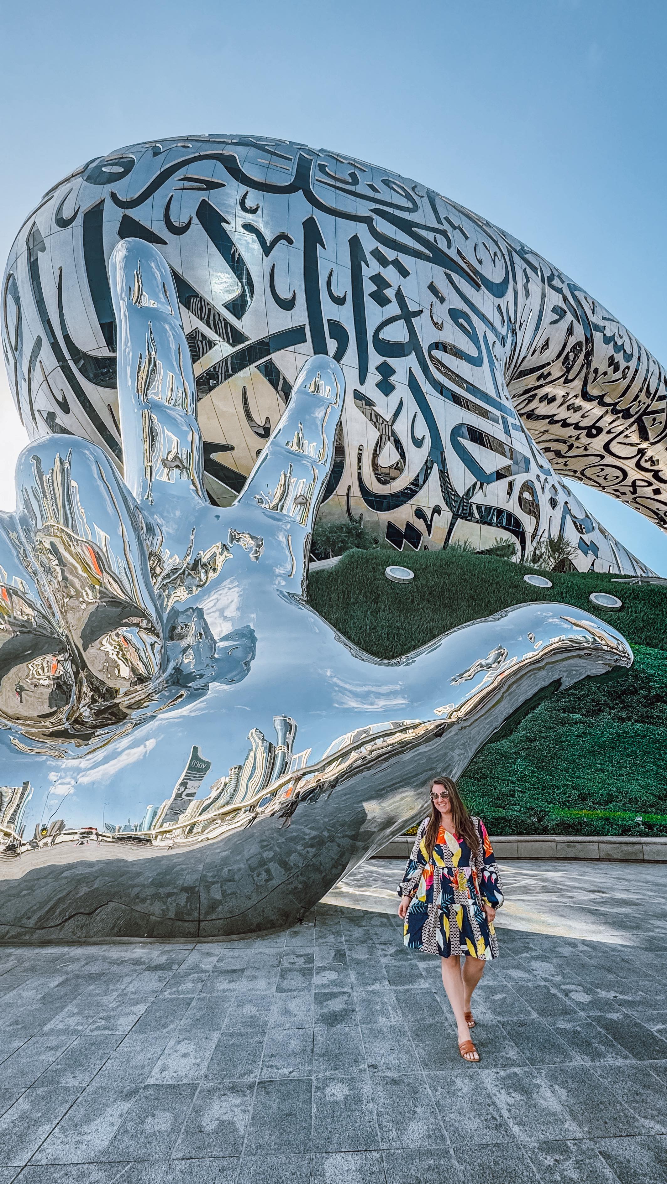 Tips for visiting the Museum of the Future in Dubai ⬇️
You will DEFINITELY want to book your ticket online in advance since it is a popular attraction in Dubai and often sells out.
The Arabic calligraphy wrapped around the building isn’t just art, it doubles as windows carved with quotes about innovation and the future from Sheikh Mohammed bin Rashid Al Maktoum. Right next to the museum you’ll also notice a towering hand sculpture making the UAE’s three-finger salute. It’s a symbol Sheikh Mohammed introduced in 2013 to represent win, victory, and love.
Personally, I recommend that you plan to arrive in the late afternoon so you can see the building in both daylight and lit up at night. It looks completely different in the day and when it’s lit up at night!
Do you like it better in the day or at night? Which view do you prefer?
#vacation #travelblogger #travelblog #traveltheworld #traveling #traveler #solotravel #sheisnotlost #traveltips #solofemaletraveler #travelinspiration #travelhacks #travelagent #traveladvisor #vacationplanning #travelplanner #travelagency #luxurytravel #travelagents #travelexpert #travel #beautifulplaces
#burjkhalifa #dubai #dubai🇦🇪 #uae🇦🇪 #dubaimarina #visitdubai #museumofthefuture #dubaimall
