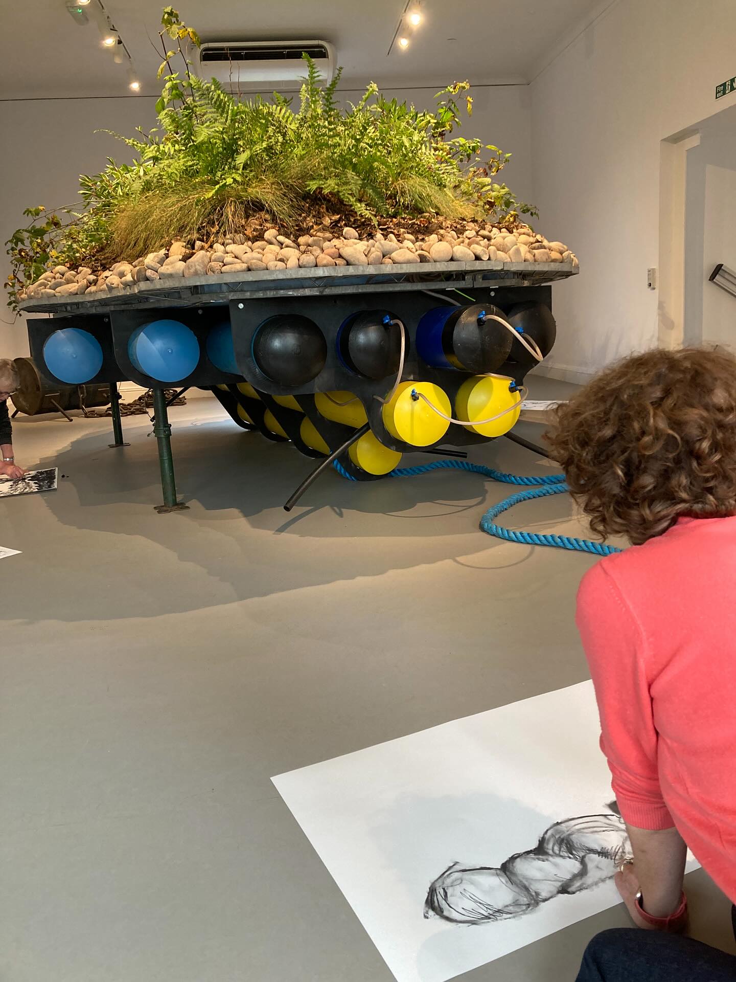 This month’s Sketch and Stroll group exploring the latest exhibition Simon Starling:Boat Works at the Abbot Hall Kendal. Until 13 March 2026. ( and at the Jetty, Bowness on Windermere) The group used charcoal, exploring markmaking with eraser, tape, glue stick. The A2 drawings were augmented with textured prints from ground charcoal and gum arabic The charcoal was rescued from an abandoned campfire by the loch near Torridon last year. If only the person who left the burnt branches could see where they ended up!)
The group embraced the idea of working on their individual art , then tearing it up to create a collaborative 1.5m x 1m composite of ‘Island of Weeds’. A lesson in reshaping, transforming and changing the perception of their attitude and approach to their art practice.#contemporaryart#charcoal#collaborativedrawing#collage#collaborativeart #galleryinspiration#abbothall#lakelandarts