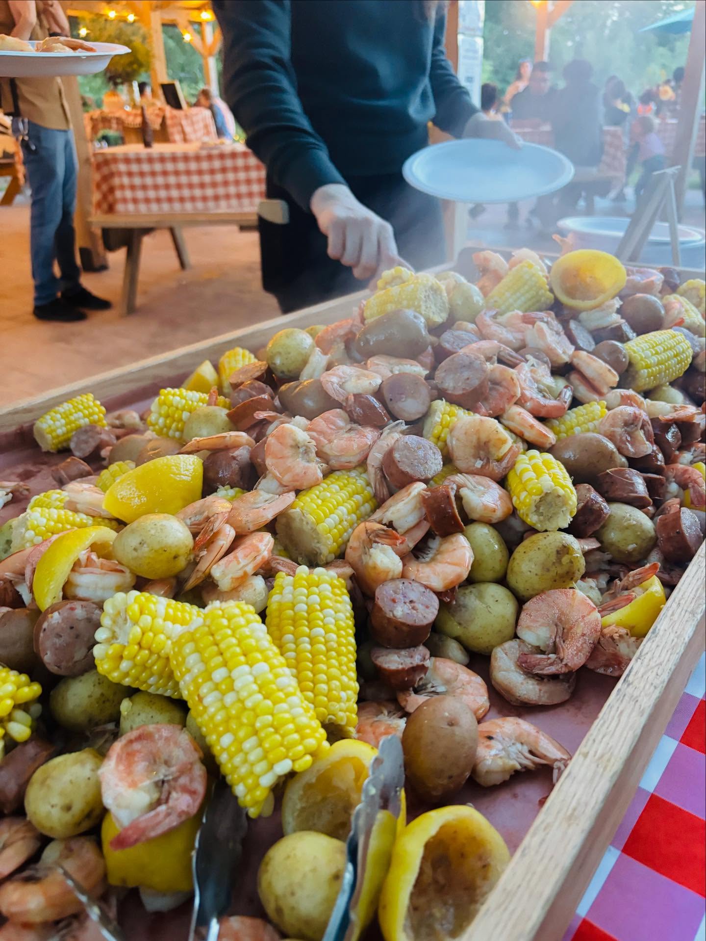Pictures from another low country boil catering. This one held at the lovely @mclawlandfarms with a backdrop of fields of colorful flowers and butterflies. #lowcountryboil #seafoodboil #seafoodcatering #shrimpboil #bbqcatering
