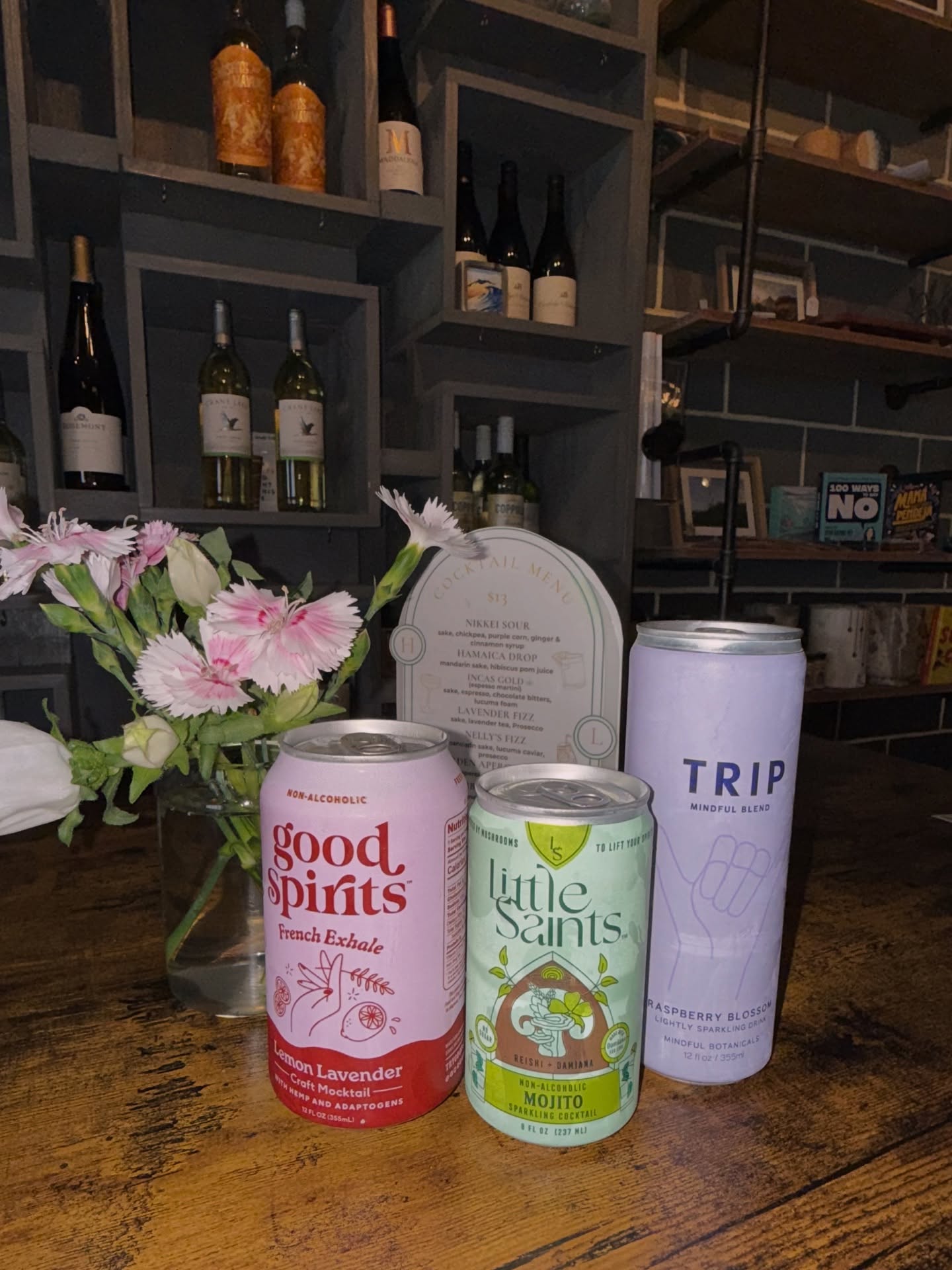 “We’re excited to add some new elixirs to our coolers! 🍹✨ Discover the art of mindful sipping with our exquisite mocktail collection:
🌼 Good Spirits: Inspired by the classic French 75, this refined mocktail blends fresh-squeezed lemon and delicate lavender, enhanced with valerian root and a soothing CBD + CBN blend. Perfect for the sober curious, it calms the body and lifts the spirit, leaving you refreshed and ready for anything.
🌿 Little Saints Mojito: Embrace the essence of summer with this invigorating mix of fresh mint and ripe limes. A warm, caramelized finish and the addition of organic reishi mushroom and damiana create a drink that not only tastes good but also promotes feelings of love and tranquility.
🍏 Trip Mindful Blend: Crafted with our customers in mind, this delightful drink features a harmonious blend of pippy raspberry and guava juices, complemented by a hint of red apple and a twist of apple cider vinegar. It’s all about finding your natural balance with every sip!