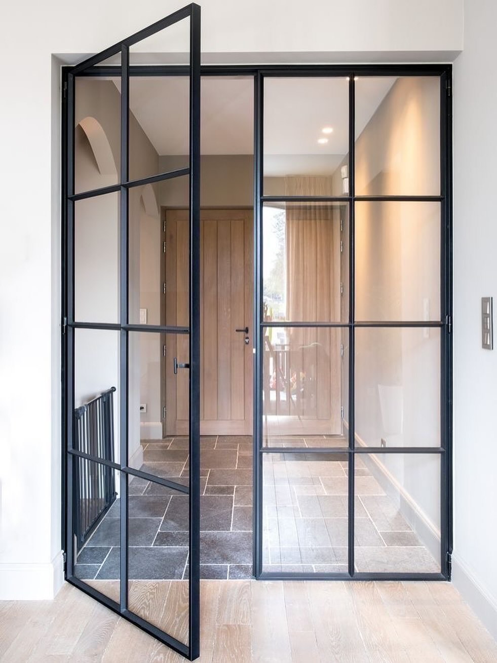 Steel framed glazing continues to define the language of modern interiors - timeless, refined and quietly assertive. It creates separation without sacrificing light, bringing balance between openness and intimacy.
At SOHO, we see these details as more than design choices - they’re architectural statements that elevate everyday living.
SOHO Developments | High-end residential extensions, loft conversions & full refurbishments