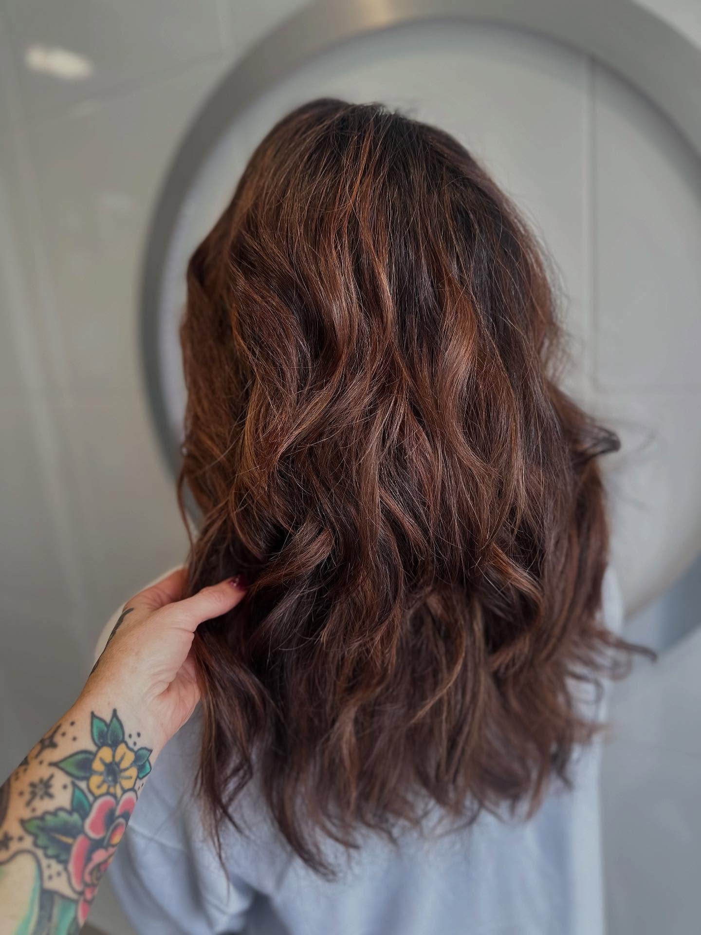 LOVED doing this transformation. The auburn with coppery and caramel balayage looking stunning with her skin tone and it’s SO Fall. 🍁 But, the real star is her new cut!
My client thought she’d have to chop her hair short to get rid of the heaviness, but instead, we kept her length and focused on strategic layering.
By removing bulk and adding movement, we gave her hair room to breathe while keeping length. This shape will look amazing with her natural curls or when styled smooth. No more “triangle” silhouette! ❤️
#raleighhairstylist #hairtransformation #longlayers #curlyhaircut #thickhairsolutions #raleighsalon #modernsalon #enchantmenthaircraft #raleighhairsalon #919hair #curlyhairraleigh #originalandmineral #loma