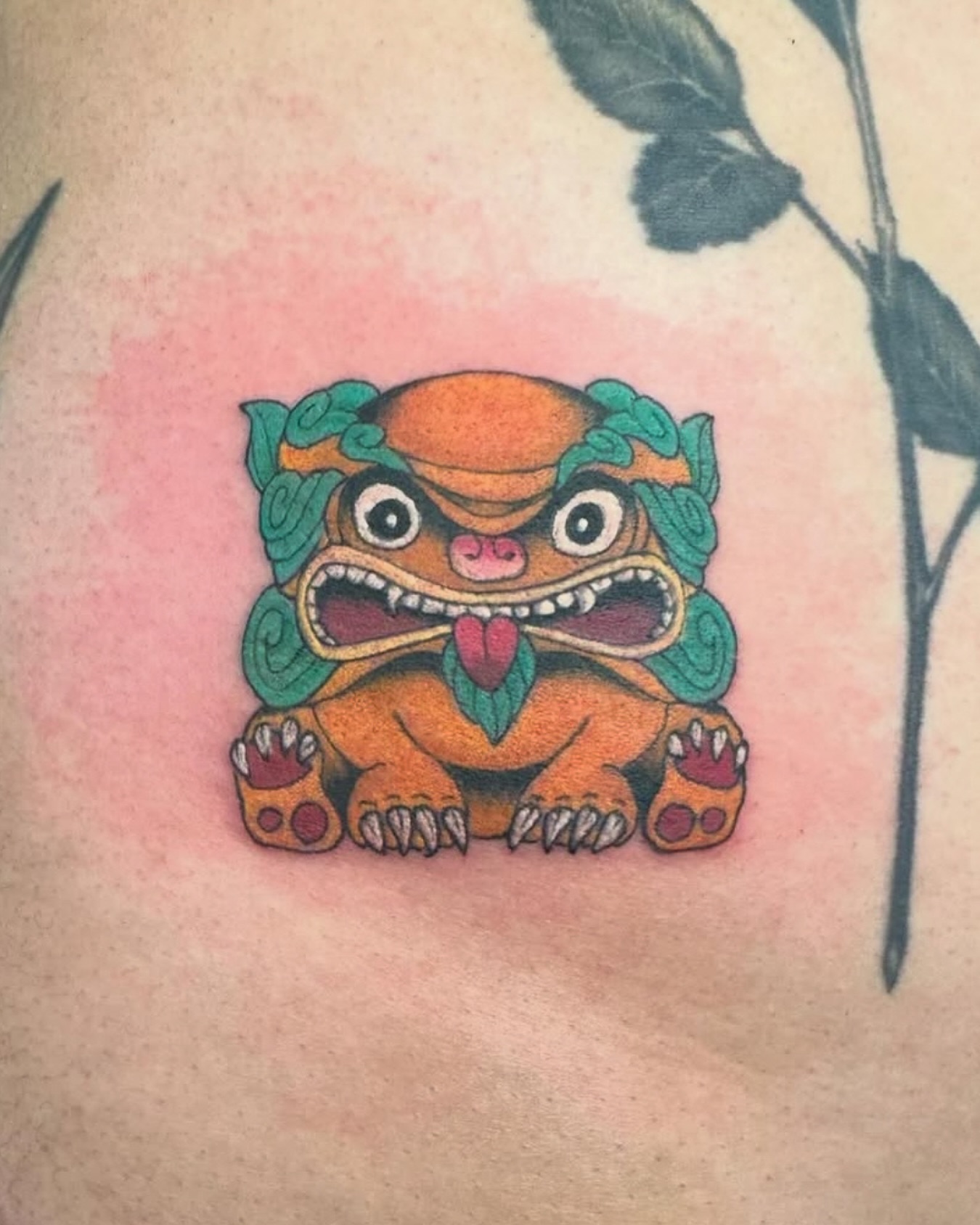 this cutie #shisatattoo done by @dave_lopez_tattoo last time he was in Okinawa tattooing at One Shot Tattoo.
