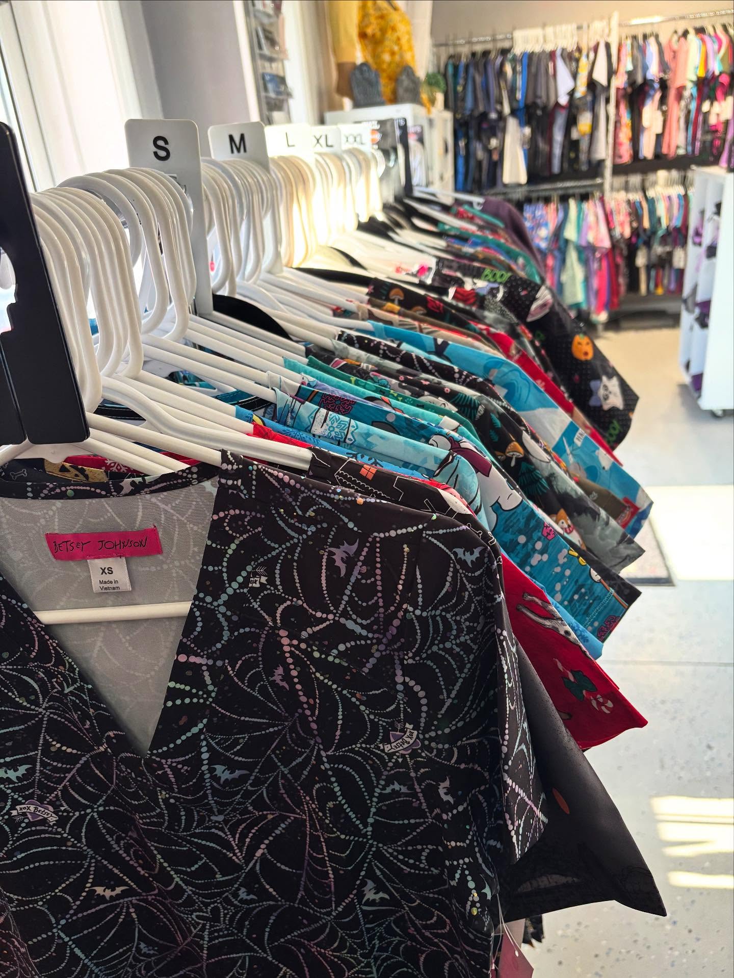 Holiday scrub tops are in. Fall patterns, Halloween prints and Christmas/ winter prints. Some prices as low as $10. Prism embroidery Monday - Friday 9 - 5:30