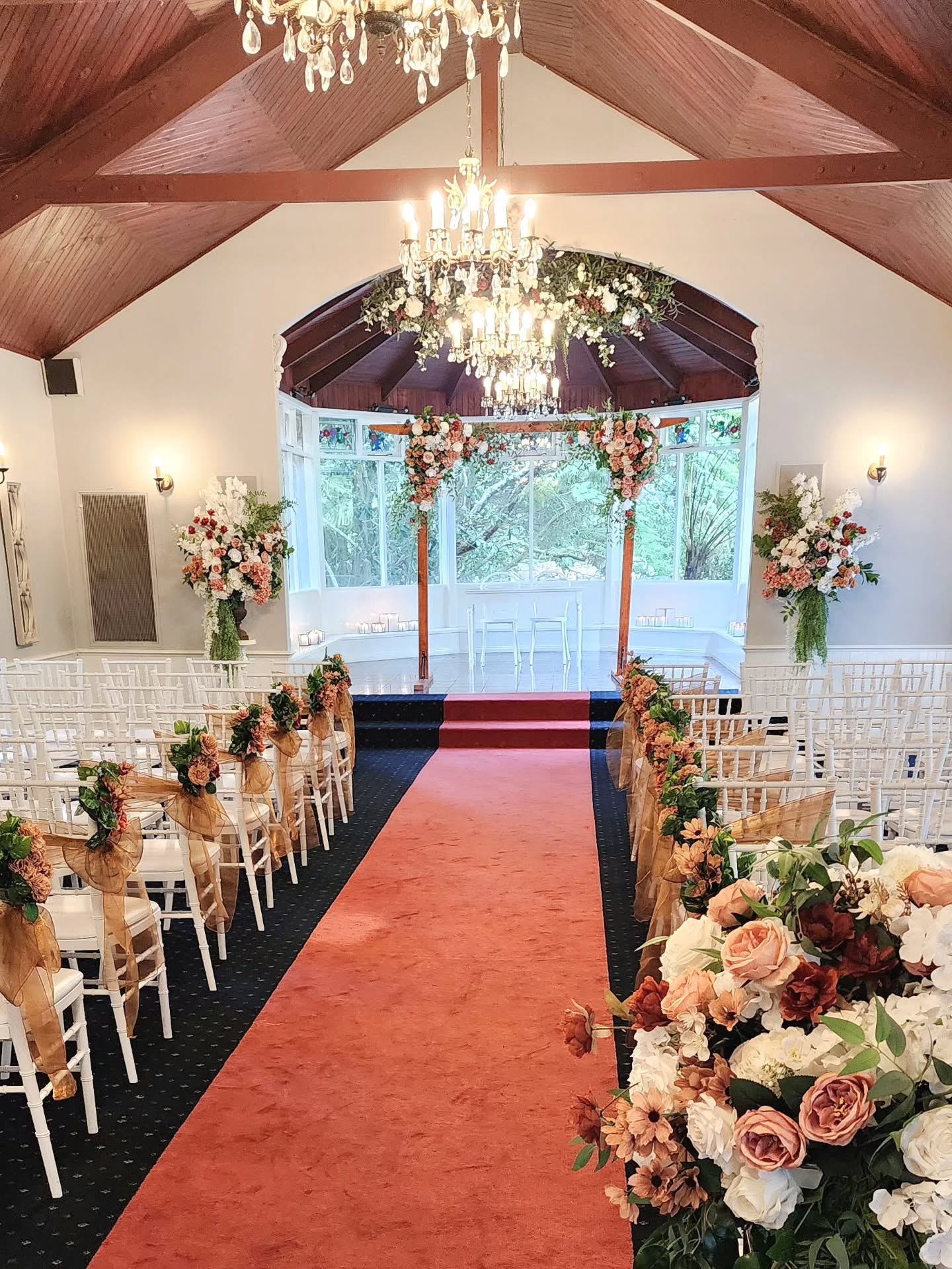 The Nathania Springs chapel, softly adorned in warm tones of rust, peach and white 🤍
Every detail is designed to enhance the romance of this beautiful setting — from the aisle florals to the ceremony backdrop, to their amazing reception areas; each piece is created with intention and care.
All florals are custom-made and everlasting, bringing the beauty of premium faux blooms to life.
For this wedding we organized all floral decor, fldower stands, welcome signs, LED candles and chair sashes throughout.
Would you like a pop of colour added to Nathania Springs florals instead? Just ask and we will make it happen!
If you’re planning your Nathania Springs or Dandenong Ranges wedding, reach out to chat about a custom floral design made just for you.
@rowyourboatprojects
@plannedwithlovebynatasha
#nathaniasprings #decodays #dandenongrangeswedding #lyrebirdfalls #poetslane #marybrooke #melbourneweddingflorist #yarraValleywedding #melbournewedding #weddingflowersmelbourne #melbourneweddingstylist #fauxflowers #artificialflowers #weddingceremonydecor #weddingflorals #weddinghire #australianbride #melbournebride #bridetobe #weddinginspo #rustweddingflowers #peachweddingflowers #weddingstylingmelbourne