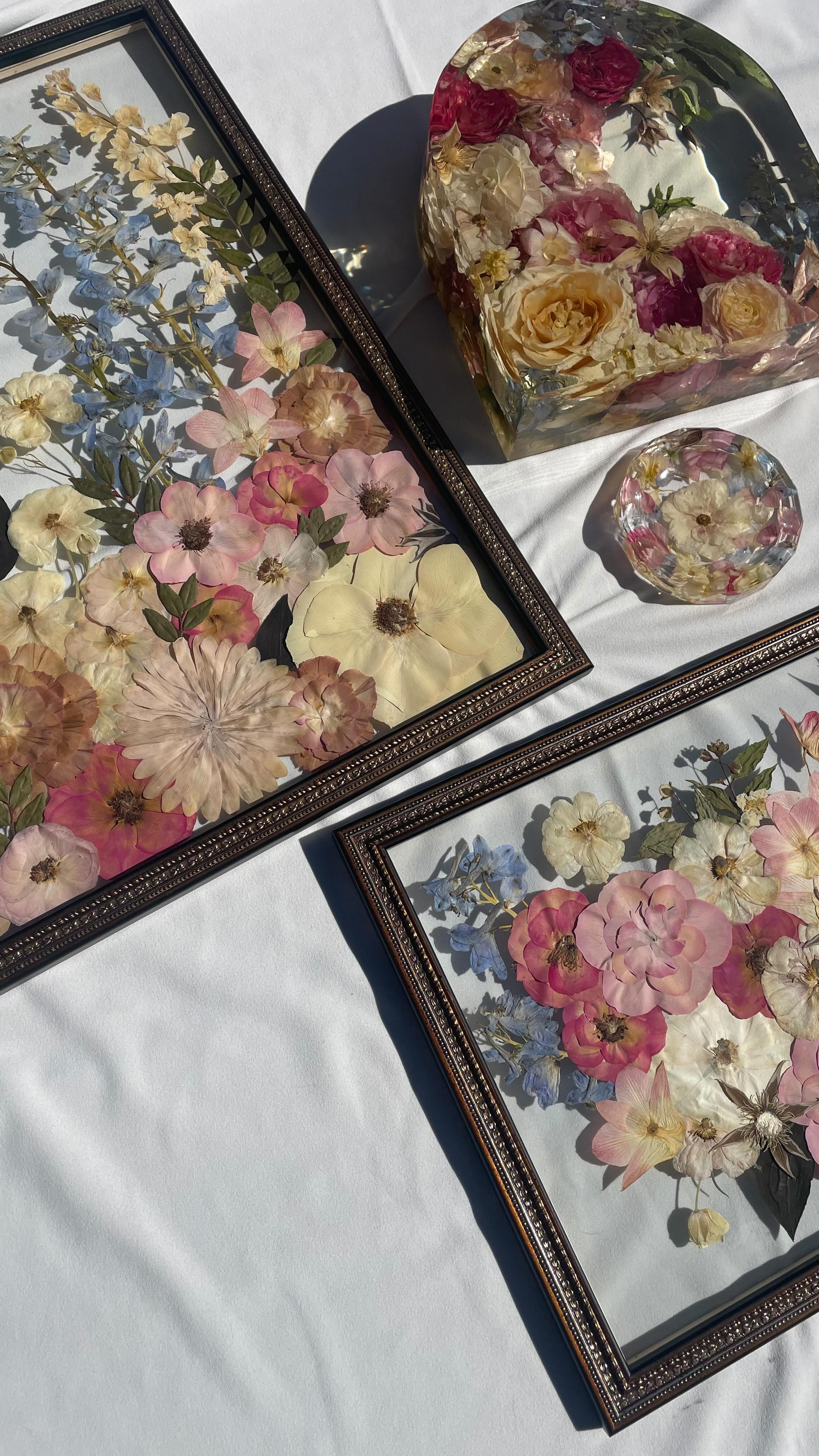 This lovely order went to its new home yesterday and I’ve been so excited to share it. Lauren’s flowers were so stunning and I was over the moon she she chose a few main pieces to showcase them!
✨
Featured is our
10”x9” resin floral arch
16”x20” vertical garden design frame
11”x14” bouquet design frame
Trinket dish
🌺
Visit HeirbloomCreative.com to learn more about floral preservation and view our many different offerings!
Florals: @gossamerfloraldesign
Resin: @icoat.epoxy
#floralart #floralpreservation #saveyourbouquet #pressedflowers #resinart #richmond #virginia #rvasmallbusiness #rvaartist #rvaengaged #rvaweddings #heirbloom #creative