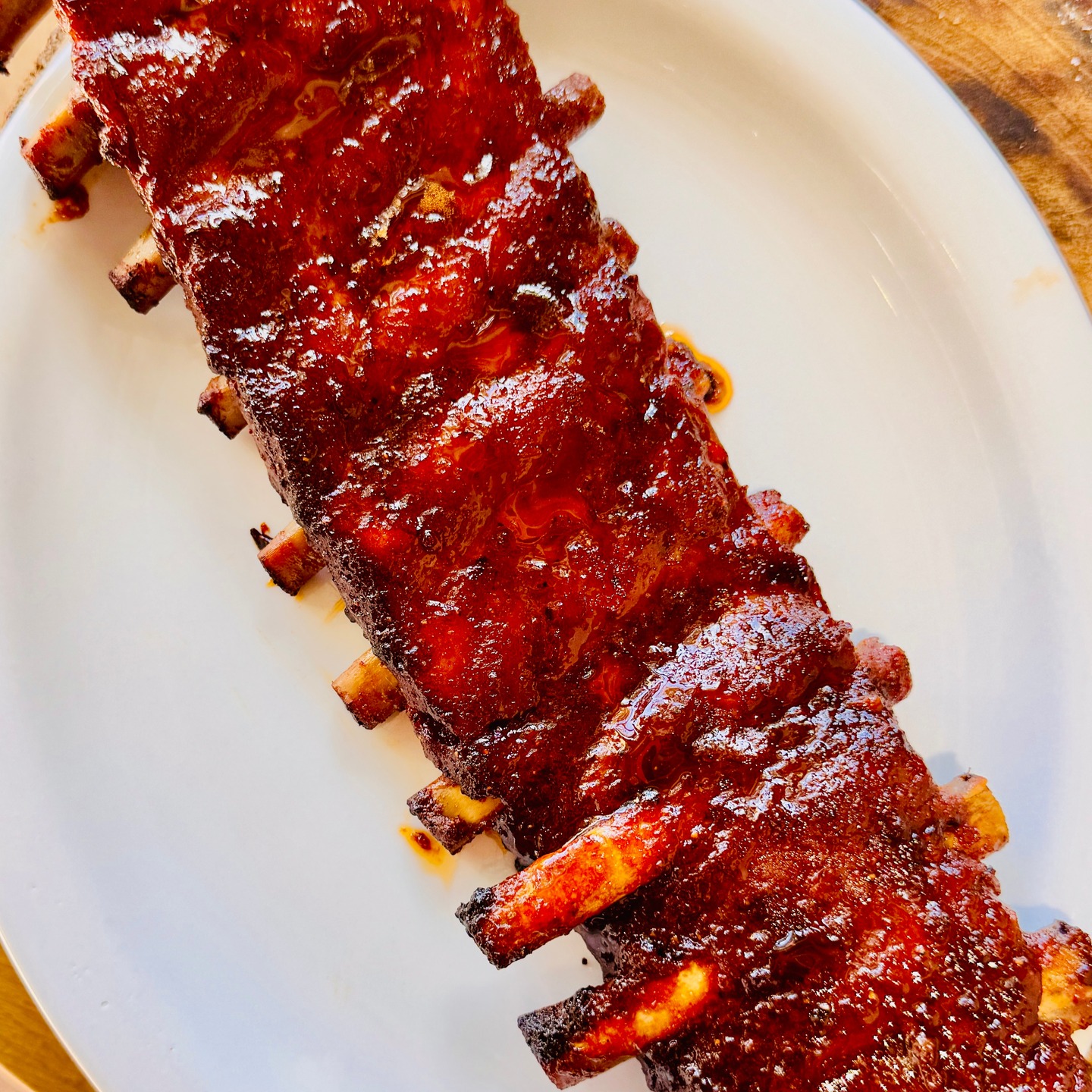 On the table tonight.
Now that autumn is here, my smoke grill is coming out. 
Baby back ribs. Glazed in "sapa" - Marche's answer to Balsamic vinegar. 110 degrees in the smoke grill for three hours. One of my favourites. 
On the table tonight. For the sake of the atmosphere, my cowboy hat is on.
That's life at Casa San Ruffino
casasanruffino.com