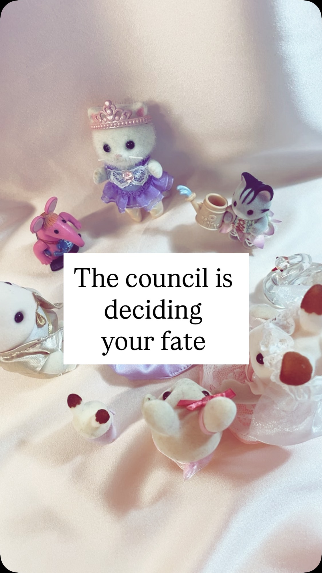 What will the council decide is your fate? 🤭
Video description- a circle of small toys including Sylvanians, a crystal swan and a Clanger with busy high pitched conferring noises and text reading “The council are deciding your fate”. The camera angle swaps and the text changes to “They have decided…”. The camera angle changes again and a small pale purple silk scrunchie is added to the middle of the circle while text reads “You deserve a little silky treat”
