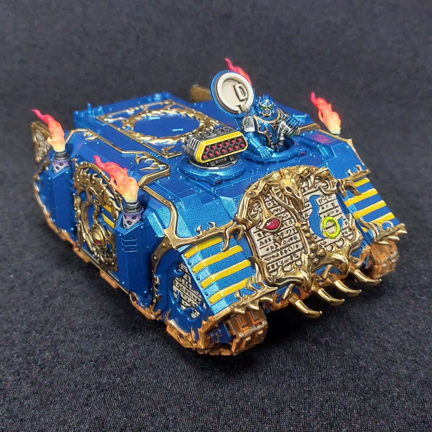 The first of my God Forged Thousand Sons tanks is now finished. As I've been using Tamiya Metallic Blue for my newer marines, I didn’t want the tank to be a flat blue, but didn’t want to risk the Tamiya paint on such a flat surface either as it's quite thick and I was worried about brush marks.
Instead, after a careful undercoat, I sprayed it Metallic Blue. It's a tad lighter than my marines, but over the years of collecting, all my Thousand Sons are different shades anyway.
Really difficult to paint over as it's super smooth and you have no margin of error as I can't repaint the blue if I get another colour over it. Weathering powders also didn’t stick to the blue either but the bottom of the tank is dirty enough.
As for the tank commander. I opted for a terminator head without the crest. Makes sense once he ducks back inside. Works well with the Horus Heresy miniatures and their attention to detail with the missing shoulder pads.
#ThousandSons
#Warhammer40k
#WarhammerCommunity
#ThousandSonsLegion
#WarhammerPainting
#Warhammer40kArt
#SpaceMarines
#ChaosSpaceMarines
#AdeptusAstartes
#Tzeentch
#HorusHeresy
#MiniaturePainting
#TabletopWargaming
#40kChaos
#MiniWarGaming
#WarhammerFan
#ChaosLegion
#WarhammerMiniatures
#PaintingWarhammer
#wip