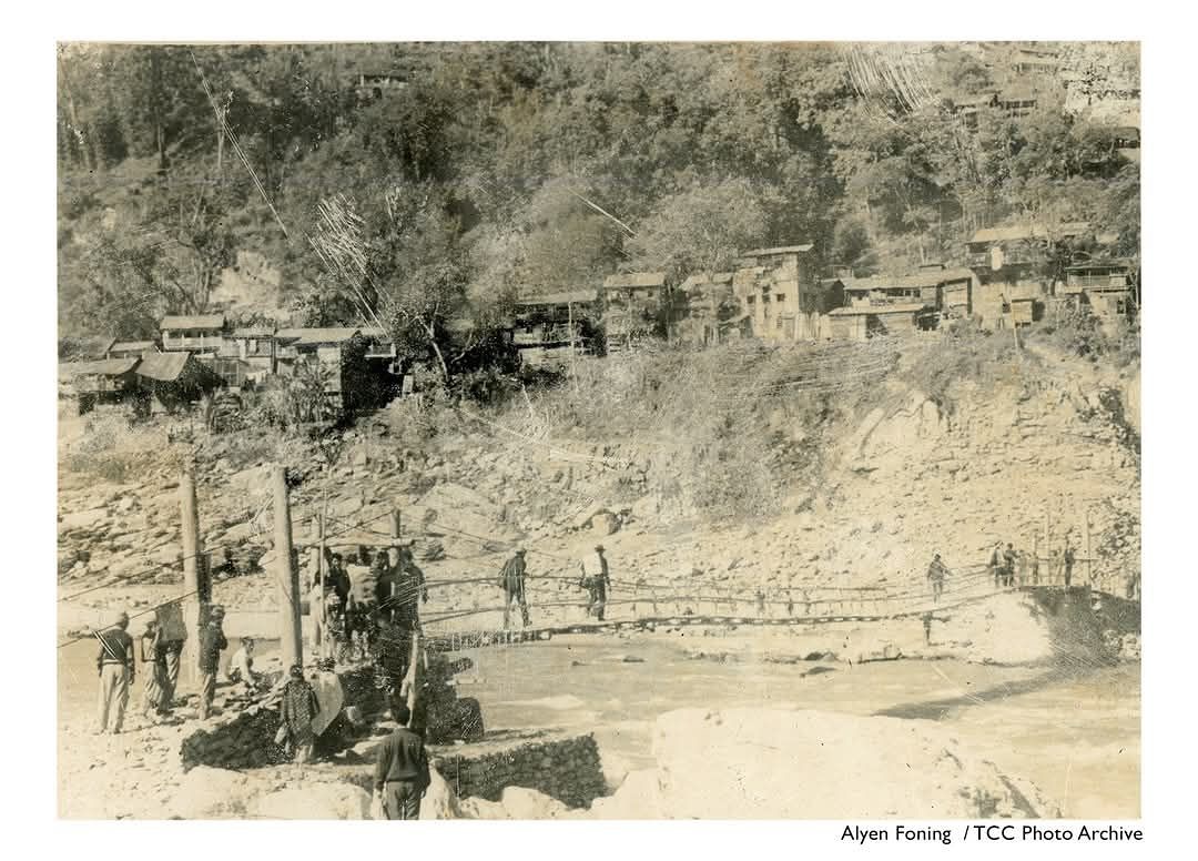 Pharkay Bridge built after the Anderson Bridge was destroyed in 1968.
Photo: Alyen Foning/ TCC Photo Archive
In 1968, when the Arsaat ko Pairo landslide swept away the Anderson Teesta Bridge, locals turned to their inherited wisdom building the Pharkay Bridge from bamboo and local materials.
Again in 2023, after the Teesta GLOF washed away more than eleven bridges, the Lepcha community in Dzongu built a Ru-Soam, a traditional cane and bamboo footbridge that reconnected all of North Sikkim.
These bridges are built fast sustainable, reliable, and perfectly suited to the mountains. They remind us that indigenous knowledge is not of the past, but a living wisdom.
With the fragile Himalayan ecosystem now under pressure from hydropower, railway tunnels, and rapid infrastructure expansion, it’s time we look back and learn from our own endogenous knowledge systems.
True resilience lies not just in modern technology but in remembering what our ancestors already knew.