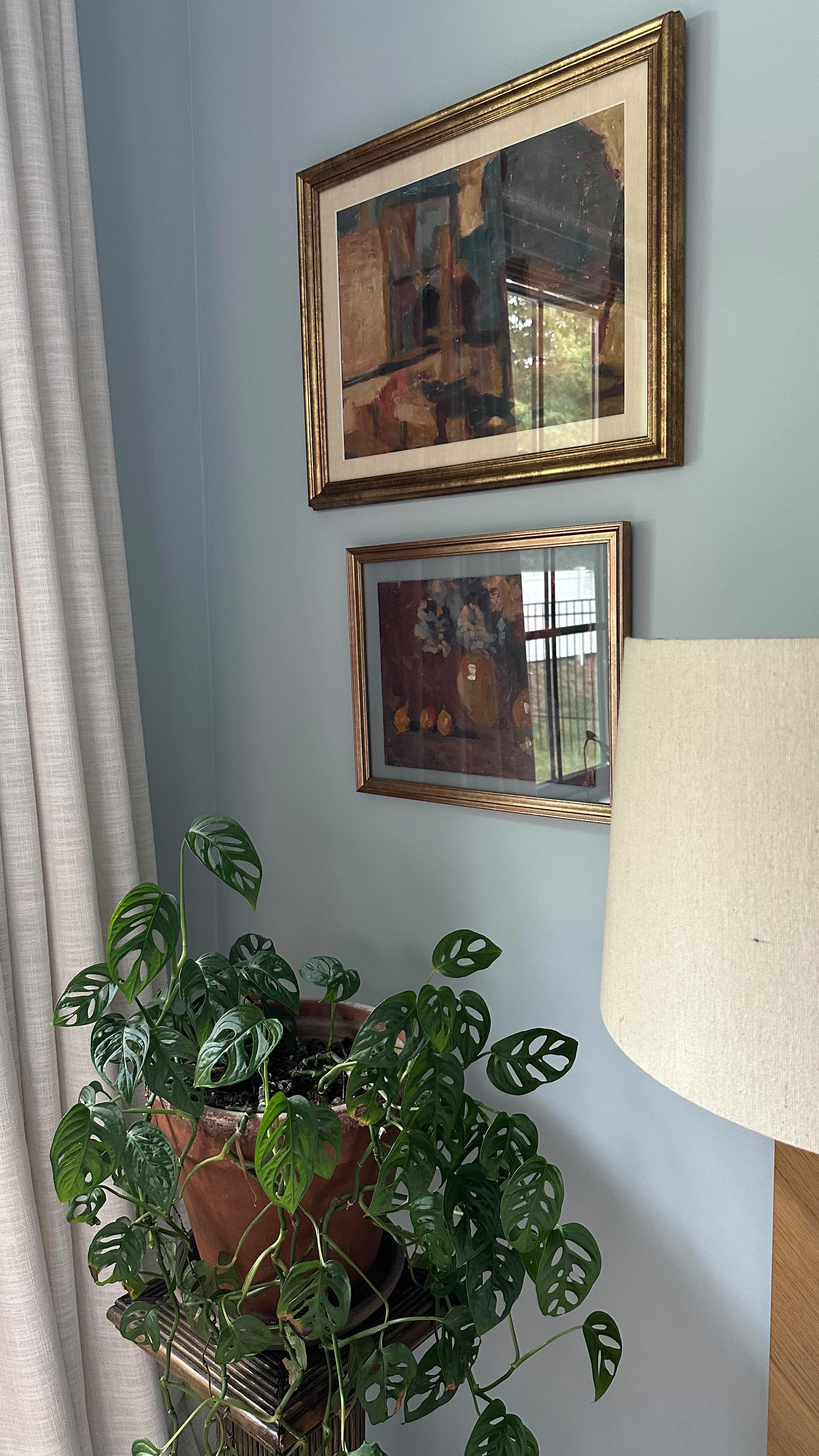 Now that you’ve seen the big picture, here’s a closer look. Textures, my plants, and art — all the layers that make this room feel alive, and mine.
The art especially has been collected over time. Since I’ve been living in the Hudson Valley and frequenting antique shops, I’ve found a few styles of art that I love. Everything in my home is an evolving mix that keeps the space feeling personal and ever-changing, which is exactly how I like it.
#shanalutherinteriors #interiordesign #blueroom #colordrenching #hudsonvalleyinteriordesign