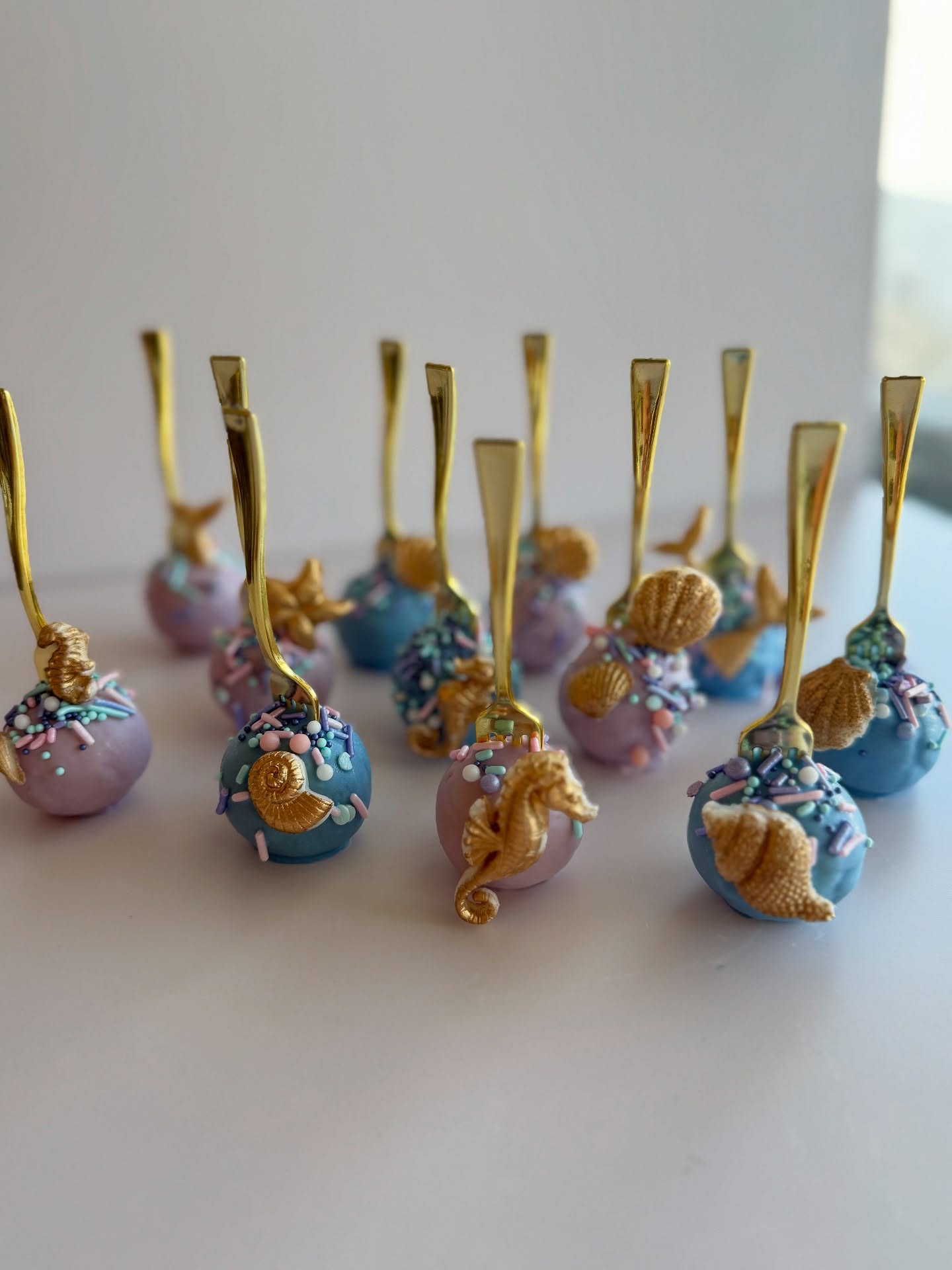 Under the sea ๐โจ These Little Mermaidโinspired cake pops are giving pure ocean magic ๐๐๐
#SweetTreatsByKaitAndKay #LittleMermaidTheme #MermaidCakePops #UnderTheSeaParty #CustomTreats #DessertTableGoals #MermaidVibes #PartyInspiration #ThemedDesserts #CakePops #MermaidBirthday #DisneyPartyIdeas #MermaidThemeParty #OrlandoBaker #DavenportFlorida #CentralFloridaBaker #SmallBusinessBaker #CustomDesserts #FloridaBaker #EventDesserts #WeddingDesserts #BeachWeddingInspo #WeddingTreats #WeddingDessertTable #CoastalWedding #WeddingCakePops #BridalShowerDesserts #WeddingInspiration #WeddingDetails #mermaidweddingtheme
