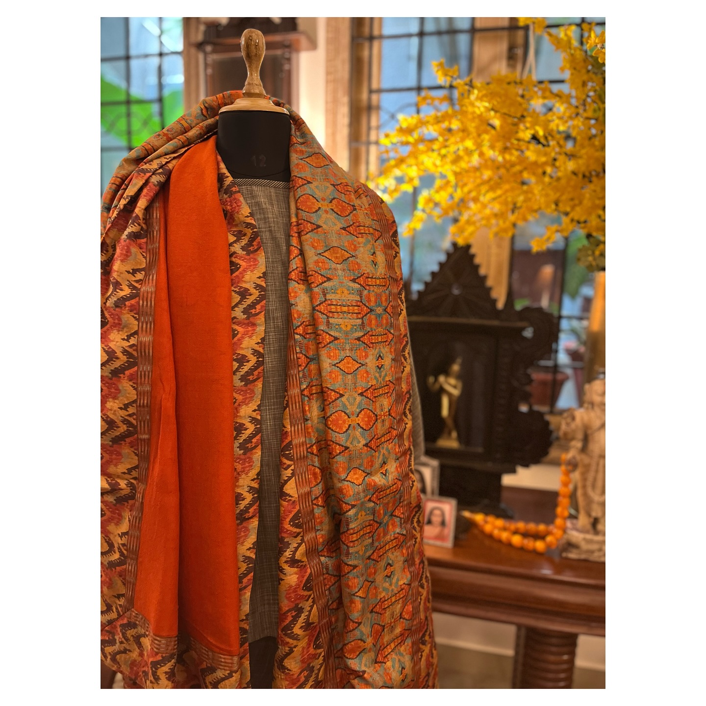 Fall in love in our Mandawa Silk & Wool Shawl ~ Elegance meets warmth with geometrics and ikat in a beautiful shade of a smoky turk with a hint of beige, rust and brown and orange with dashes of turquoise.
Designed for festive evenings
of friendship, intimacy, and togetherness.
Digitally printed with one our favourite patterns on handspun and handwoven tussar silk and backed by a chasmebulbul pure wool - can be worn both ways.
.
.
.
#bespokeclothing #festiveedit #limitedcollection #oneofakindclothing #giftsforher #diwaliedit #delhifashionblogger #shopslow #shopsmall #wintercapsule #smallbusiness #smallbusinessindia #vocalforlocal #supportindiandesigners #woolshawl #heritageclothing #museumclothing