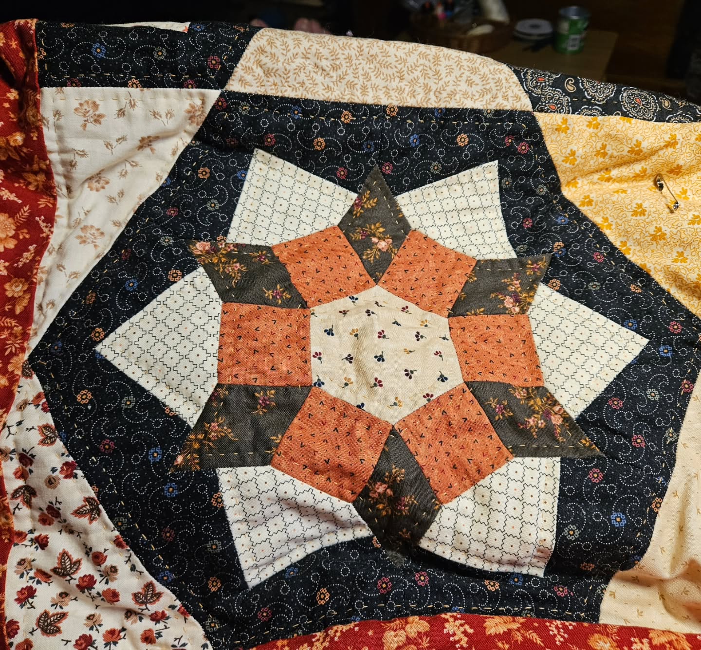 Had a great time at the Hungry Housewives show yesterday. Today, I was recovering and back at the personal project of hand-quilting my EPP Crowning Star quilt. A couple of half blocks, this full block, and some connecting triangles are now done. It's getting put away for a couple weeks now because next weekend will be 2 different shows! Stay tuned for more posts on those this week.
.
#crowningstarquilt #crowningstarqal #elisebaek @elisebaek #handquilting #handquilter #quiltbyhand #epp #englishpaperpiecing #postapocalypticlifeskills #fiberartistsofinstagram #quiltersofinstagram
