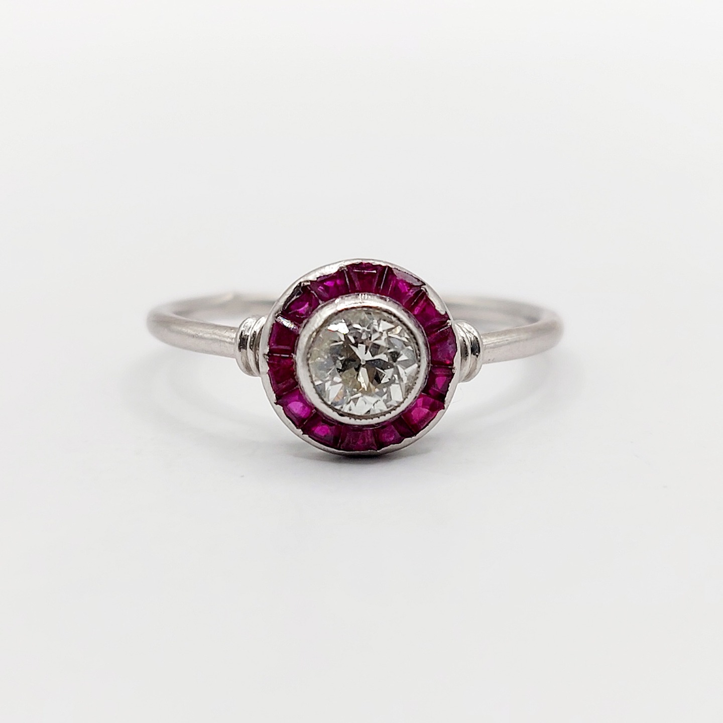 French art deco target ring Platinum set with a 0.45 carat old mine cut diamond surrounded by calibrated synthetic rubies (circa 1910)
PRICE : 960€
Magnificent and rare work by a French art deco goldsmith
Size: 54.5 FR / 7 US
Weight: 2.85 g
Diamond size: approximately 5.0 mm (estimated at 0.45 carats)
Diamond in perfect condition, small inclusions visible under a magnifying glass
Ring head size: 8.6 mm
Micro-scratches from use, slightly irregular setting around the rubies
PLEASE NOTE: One of the rubies has a chip (surface chip, the stone is not split)
Mascaron hallmark (French Hallmark)
#frenchjewelry #diamond #diamondring #antiquering #victorian #victorianring #marquisering #augustusjewels #vintagering #daisyring #daimondhaloring #tragetring #oldminecut #oldminecutdiamond