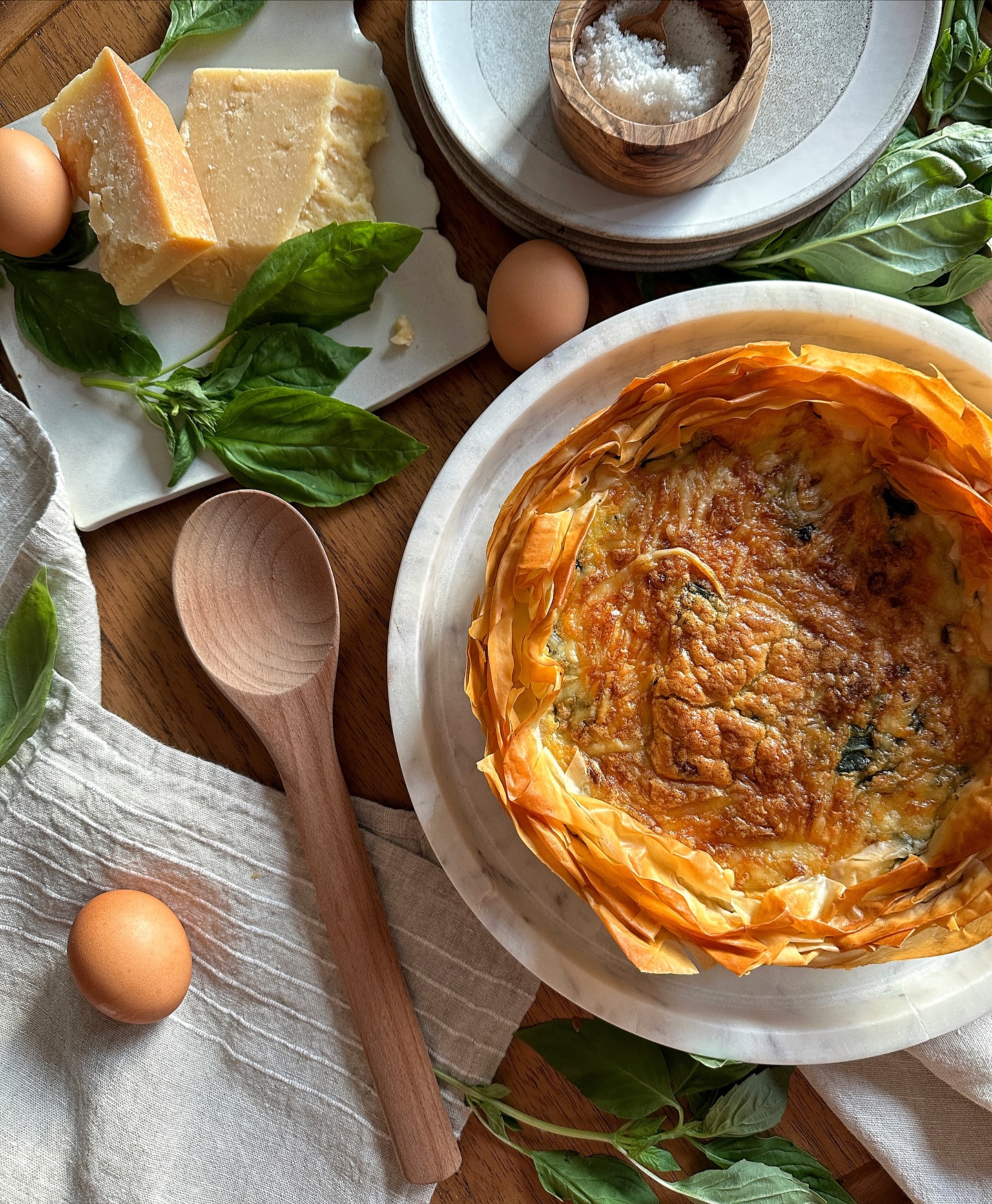 Looking for the best fall brunch dish? My famous french country quiche is just the slice you need to make your morning better than ever.
Here’s my recipe: 🥧
For the crust: Use a store-bought pie crust or pâte brisée if you prefer to skip homemade dough.
For the filling:
2 medium potatoes, thinly sliced
250g fresh spinach (or 150g frozen, thawed)
150g Gruyère cheese, grated
4 eggs
200ml crème fraîche (or heavy cream)
50ml whole milk
2 tablespoons butter
Salt, pepper, and a pinch of nutmeg to taste
Instructions:
Preheat your oven to 190°C (375°F). Line a 9-inch tart pan with your crust and prick the bottom with a fork.
Heat butter in a skillet and sauté the potato slices until just tender, about 5 minutes. Set aside. In the same pan, wilt the spinach over medium heat for 2-3 minutes, then squeeze out any excess moisture. Season both with salt and pepper.
Whisk together the eggs, crème fraîche, and milk in a bowl. Season with salt, pepper, and nutmeg.
Scatter the potatoes and spinach across the crust, then sprinkle most of the Gruyère over them. Pour the egg mixture carefully over the vegetables, then top with remaining cheese.
Bake for 30-35 minutes until the custard is set but still slightly creamy in the center, and the top is golden. Let cool for 5 minutes before slicing.
Serve warm or at room temperature with a simple green salad. Bon appétit!