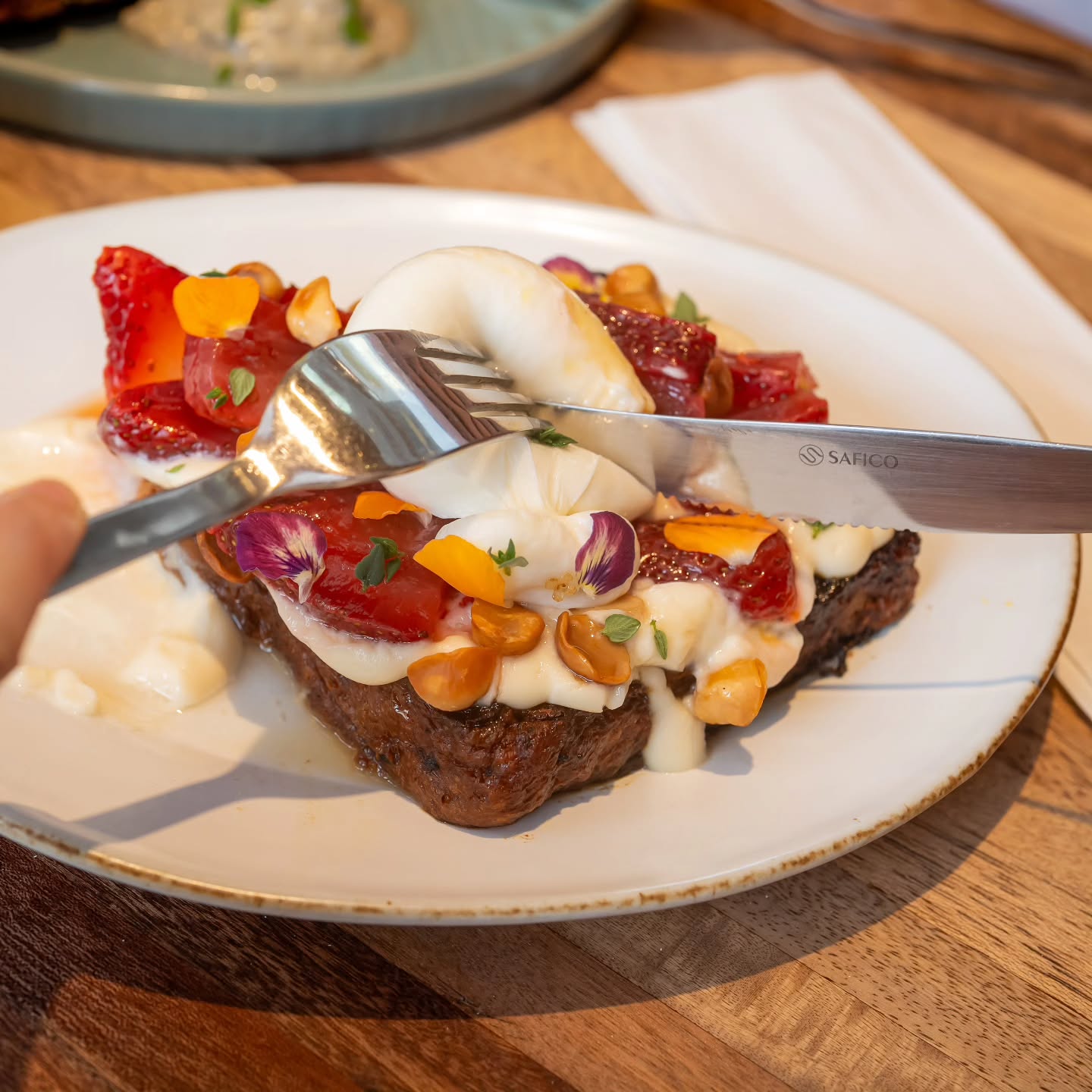 Morning light, milk rice custard and strawberries steeped in osmanthus. Then the moment that Burratina bursts and everything turns creamy, sweet and floral.
Available in limited servings. Each Shokupan is soaked overnight before we fry them up!