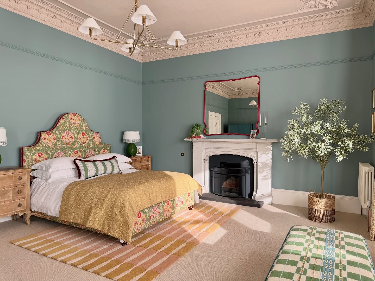 It’s taken a few months but I’m very happy to be finally sharing some before and after photos of my own bedroom transformation.
Yes, it is ridiculously big! It would have been the main living room when the house was built, hence all the very impressive ornate plasterwork. We originally painted the walls in @farrowandball Green Smoke but after a few water leaks from the roof, we had the opportunity to rethink the design. I felt I wanted to create a more vibrant space and try and make the room feel a little less cavernous.
One of the biggest decisions was painting the ceiling and plasterwork in pale pink (Scallop) but I’m so glad we did as this wash of colour across the ceiling has really given the room a much cosier feel. The walls are painted in Oval Room Blue and the Ikea wardrobes were given a lick of paint in an archive colour by Farrow & Ball called Sloe Blue.
The curtains were also a big consideration due to the number of windows. The trailing leaf pattern (from @warnerhouse_1870 ) in a golden yellow colour brings so much warmth, even when it’s a grey day outside, it feels sunny inside. We took some risks by including quite a lot of bold fabric patterns, but I think these have really helped to bring the room to life. The room feels happy now, which makes me feel happy spending time in it 😊
With thanks to the very excellent @kindlendecorators for the brilliant and careful job on all the paintwork.
#savinggracesinteriors #interiordesign #bedroomdesign #beforeandafter #home