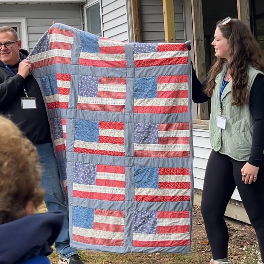 After the ribbon cutting, Scott was presented with a handmade quilt by his niece, Gabby, that will be enjoyed by visitors at The Farmhouse. There are still plenty of needs on our wishlist!