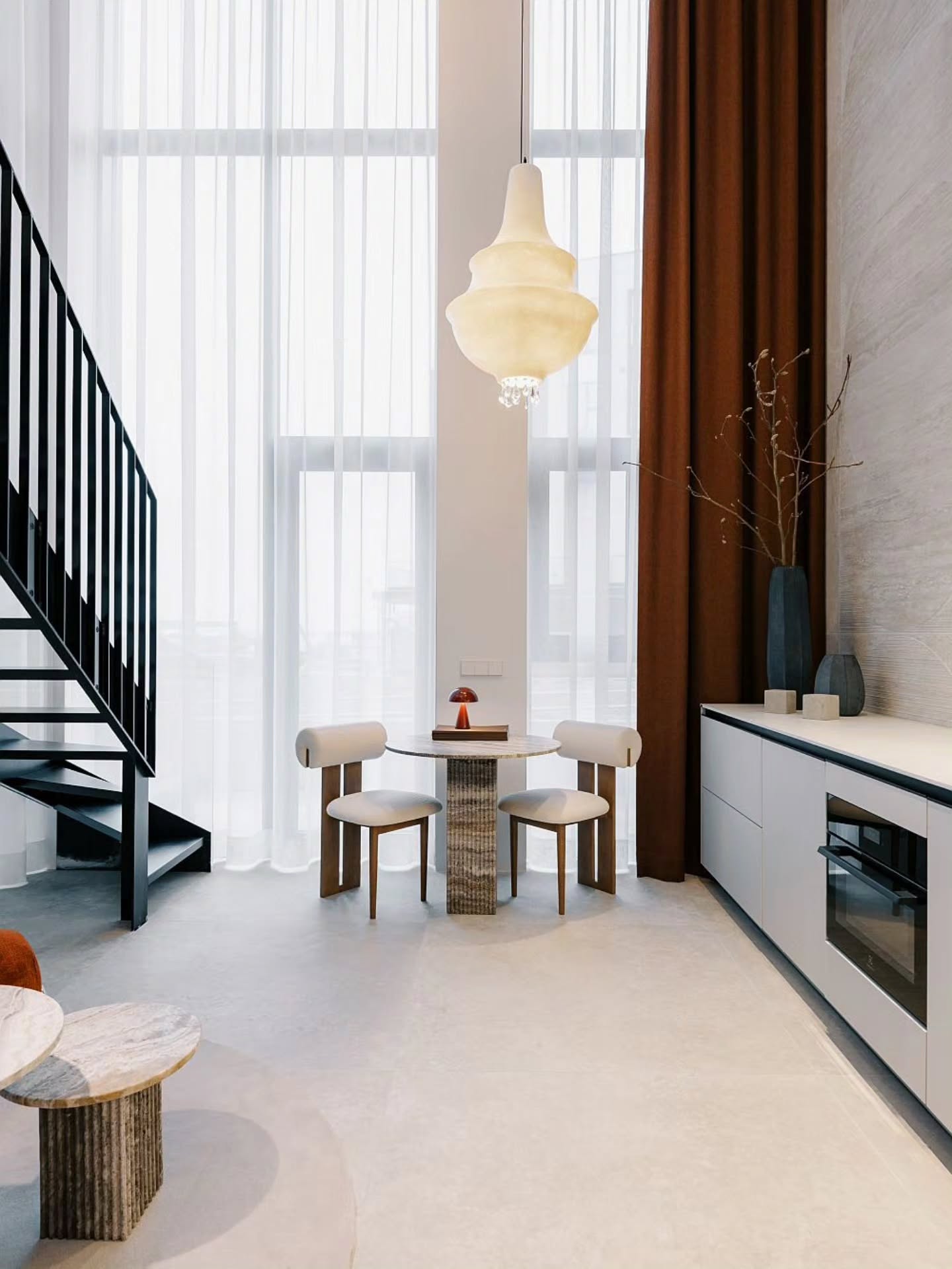 Take a look inside a beautiful loft at Kalaranna. This stylish apartment has high ceilings and lots of natural light. A black metal staircase adds a modern touch. White marble surfaces bring a sense of luxury. The elegant Lady D light by Karman descends gracefully in the center of the room. Its soft, layered design looks like a light sculpture. The crystals add a sparkling luxury feel. The silhouette of the lamp follows the shape of a grand chandelier. It draws the eye and adds elegance and calm to the space. Other lights used include @karmanitalia Filomena, @marsetbcn Djembe, and @nekolighting 48V profiles. Interior design: Silvia Bauer and Maria Varblane. Developer: @prokapitalgrupp Photos by: @tonutunnel #hektorlight #valgusealgus #valgustid #porfolio #decorativelighting #designlamps #lightingideas #interiordesignideas #decor #homedecorideas #homedesign #interiordecor #interiorstyle #homelighting #modernlamps #modernlighting #moderndesign #lighting #design #lightingdesign #interior #interiordesign #lamps #architecture #homedecor #homestyle #homedecoration