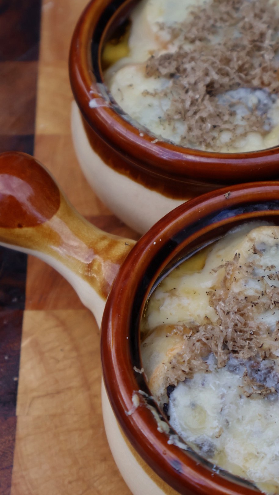 A cold fall night requires a comforting soup. This French onion is an easy go to 🍂 recipe below, save this post for later!
———————
Ingredients:
- Vegetable broth
- Sweet onion
- Purple onion
- Shallot
- Garlic
- Thyme and bay leaf
- Dijon mustard
- Worcestershire sauce
- Gruyère cheese
- Sliced baguette
- @sabatinotruffles Black truffle sauce
Directions:
1. Thinly slice all the onions, garlic and shallots. In a large pot, cook them low and slow with a bit of oil or butter until deeply caramelized and golden brown.
2. Stir in the Dijon mustard and Worcestershire sauce, mixing well to coat the onions.
3. Add the vegetable broth, thyme, bay leaf, salt, and pepper. 4. Simmer gently for 30–40 minutes to develop flavor.
5. Ladle the soup into oven-safe bowls. Top each with a slice of baguette spread with black truffle sauce.
6. Layer sliced Gruyère cheese over the bread and broil until the cheese is melted and bubbly, about 10 minutes.
7. Finish with freshly grated black truffle for an indulgent touch.