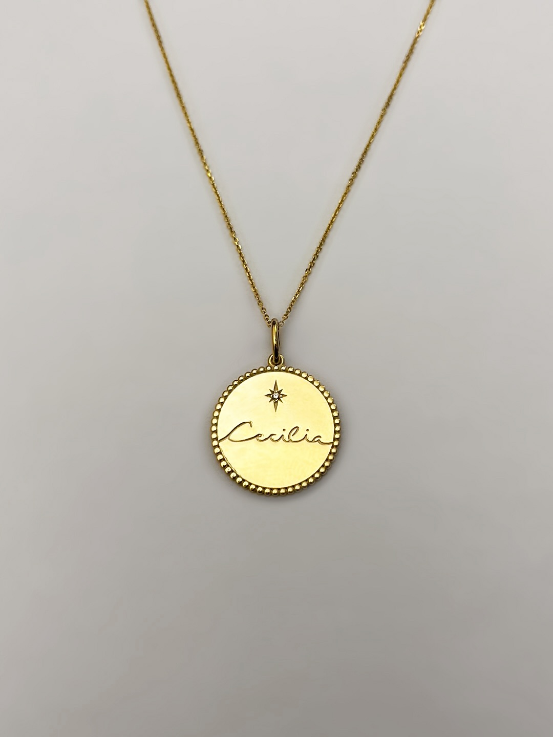 Personal, precious, and beautifully hers⭐️A pendant engraved with her baby’s name and adorned with a diamond for the proudest mammy!
#mkfinejewelry #bespokecreations #custommadejewelry #pendant #necklace #diamond #yellowgold #gold #nameengraving