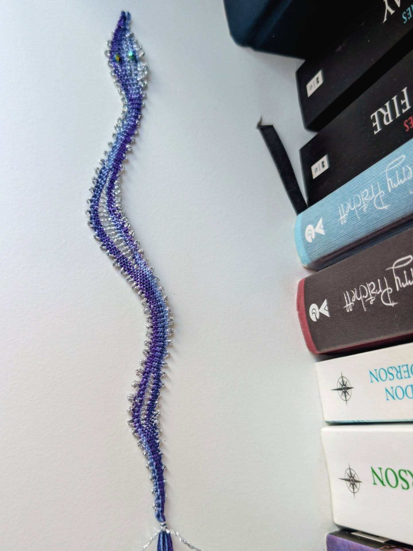 And he's done! Oh the variegated thread looks fab! I love 💙 this @wonderfil.uk thread so much I'm thinking up new designs just so I can use it! 🤣
I'm not sure if this is something I can offer as a class just yet as it's not my design but if you are interested let me know in the comments and if there's enough interest I'll have a think about how I could make something work🤔
The thread however would work beautifully for needle lace and I already have a couple of projects in mind so watch this space!
#lacemaking #lace #snake #crystals
#bookmark