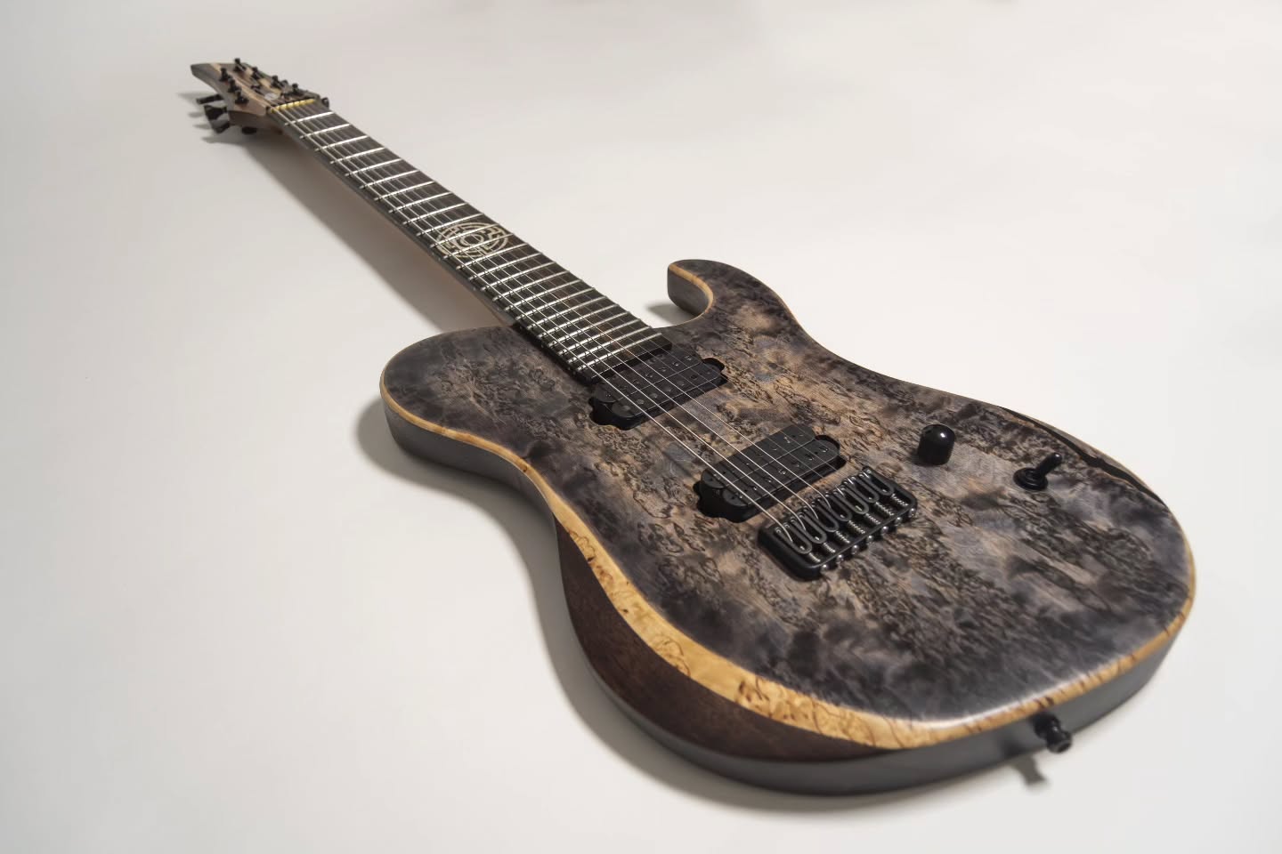 The Community Build 2024. You spec'd it, I built it. And now it's finally available on the site!
Featuring
A Karelian birch top on a mahogany body
5-piece walnut and maple neck with an ebony fretboard
27" scale length, 24 @sintoms_ltd Very Hard NS frets
Custom 12th fret inlay, Luminlay side dots
@hipshotproducts hardware
@seymourduncanpickups Nazgul & Sentient pickups
Brass nut, strap locks, coil split
I am absolutely proud of this one, it turned out great even if I say so myself. You guys really know how to spec something cool. The 2025 build will be RIDICULOUS though 😅
DM me for more details of this guitar if you want it for yourself or check out the site🤘🏻