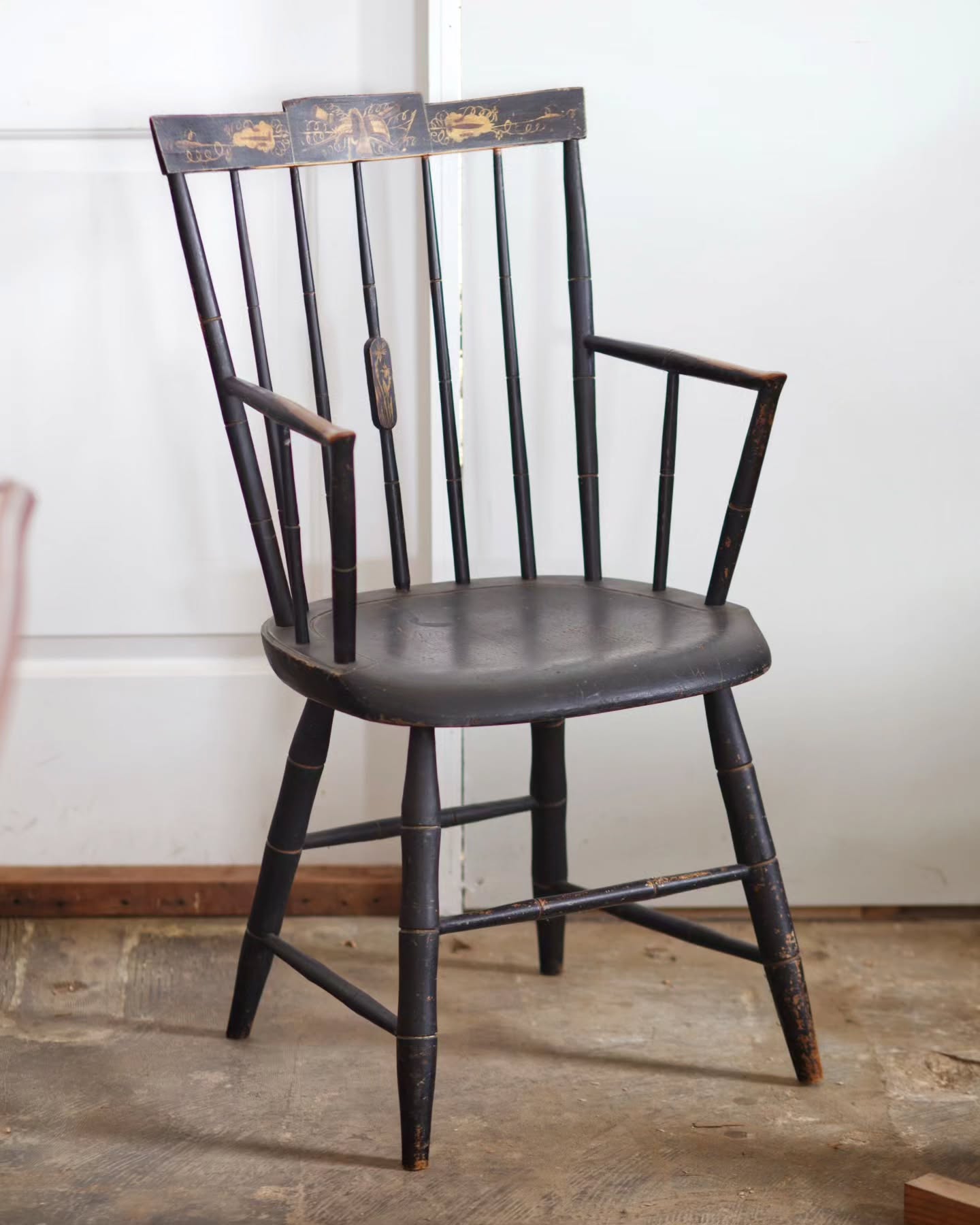 A rear spindle broke across the grain at the worst possible place: exactly where it meets the tapered round tenon of the arm.
In lieu of replacing the whole spindle, the left and right sides of the spindle had material removed at the tenon. I wanted to remove enough material, but not disturb the tenon itself as that might interfere with future repairs. New wood was then glued in, shaped to the correct size, and painted. Texture was applied to match the crusty old paint on the rest of the spindle.
#furniturerestoration #furniturerepair #furniturerestorer #chairrepair #paintedfurniture #paintedWindsor #windsorchair #restoredinbaltimore