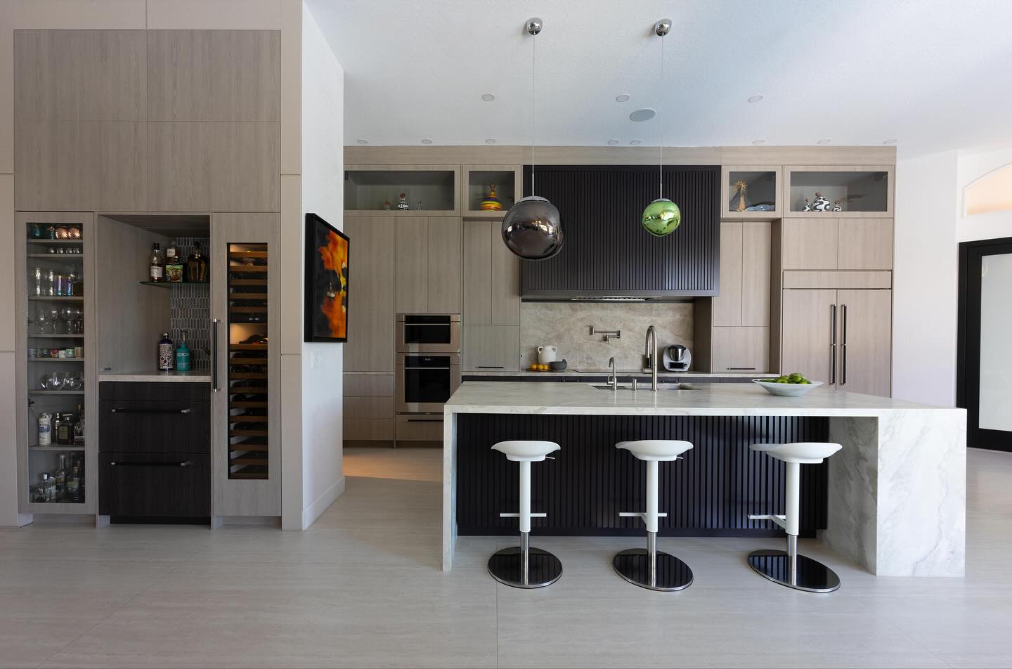 Modern minimalism meets bespoke craftsmanship in this Weston kitchen and bar design.✨
Clean lines, warm neutrals, and natural stone to create a space that feels effortless yet intentional. A refined take on modern minimalism, crafted for how we live today.
Millwork by @earthsourcedesign
Photography by @laurenalexis.photo
Design by @mldesigninteriors
#ModernKitchen #BespokeDesign #MinimalistInteriors #TajMahalQuartzite #CustomMillwork #OrganicModern #KitchenDesign #InteriorArchitecture #MLDesignInteriors