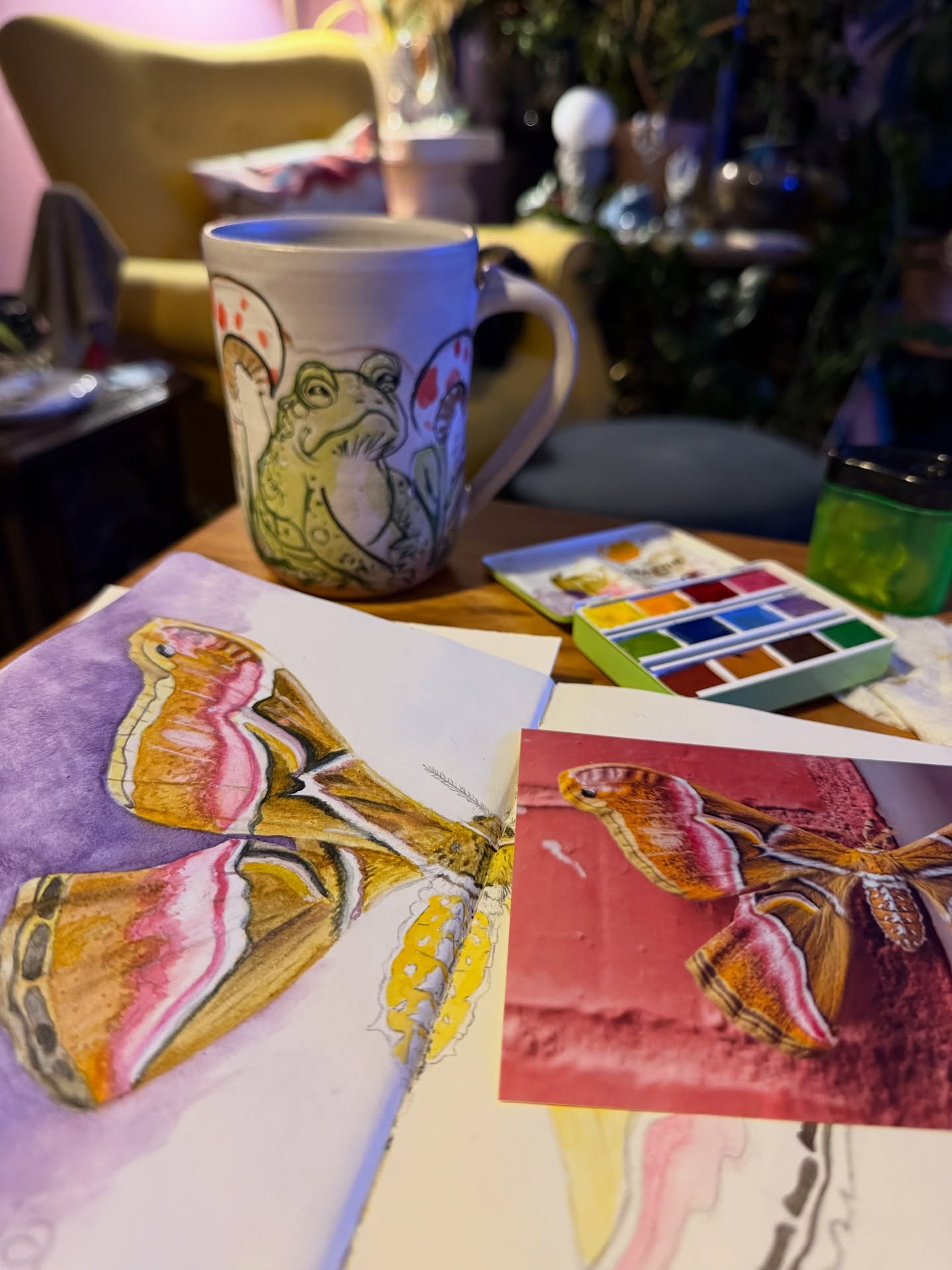 Sipping on a cuppa Digestive Tonic tonight. A delicious tea to have nearby while I paint. I have been absolutely OBSESSED with drawing insects in my sketchbook. My sketchbook is a place for me to create pocket-sized artworks that can travel with me wherever I go. I can’t work in here and just “sketch” or plan a piece out; I love to create smaller, finished pieces that travel easily along with my supplies.
I’ve been working on this silkmoth for so long, I am thrilled to finally work on adding color using my amazingly smooth and vibrant @charvinarts watercolors. I got them at this beautiful art supply shop down the street from our hotel in Paris when my fiancé and I went to Europe this past summer. I cherish these watercolors for the memories they carry now. 🥰
Would you like to see more of my bugs?