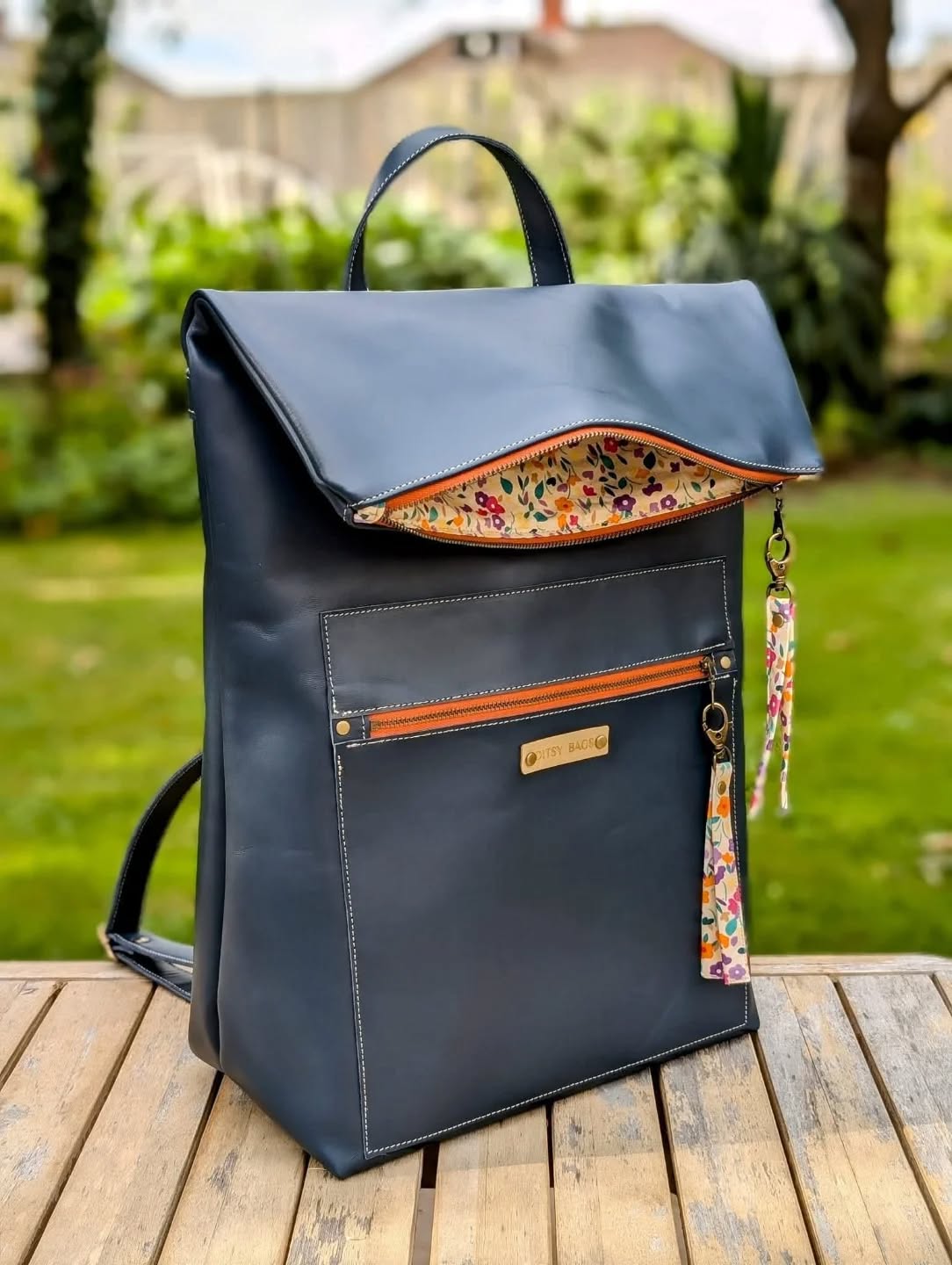 🎒 This backpack’s got it all — smooth navy leather, a pop of orange sass, and a floral lining that basically screams “surprise!” every time you open it 🌸💃
It’s the perfect mix of classy on the outside, party on the inside.
Handmade, cheerful, and ready to carry all your chaos (stylishly, of course).
🧡 Crafted by @ditsybags
#FunFashion #BackpackGoals #HandmadeHappiness #FloralInside #StyleWithPersonality #DitsyBags #LeatherLove #AdventureReady