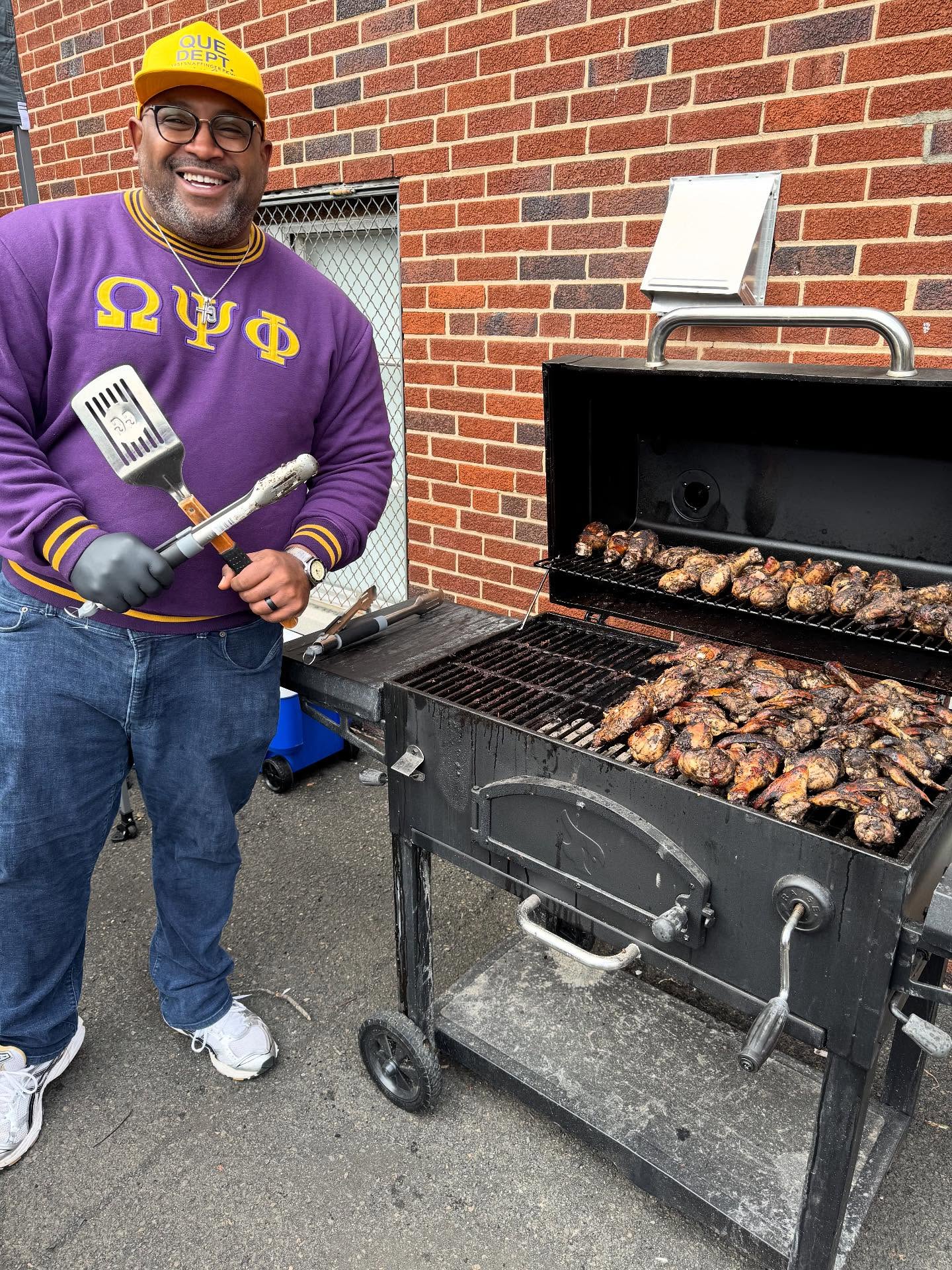 Omega Psi Phi in the house grilling at Praise Is The Cure Day of Hope, Health and Healing.