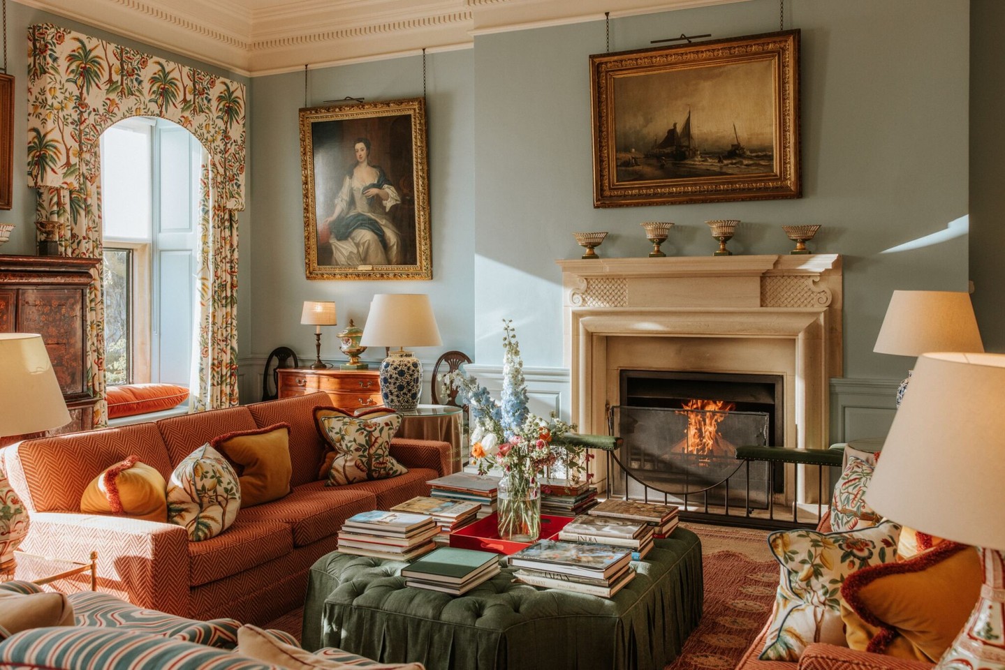 The perfect sanctuary from the rain! ☔️. Our upstairs drawing room is pure, cozy luxury today. With the roaring fire lit and a jigsaw on the cards table, this is where we're hiding out until the sun returns.