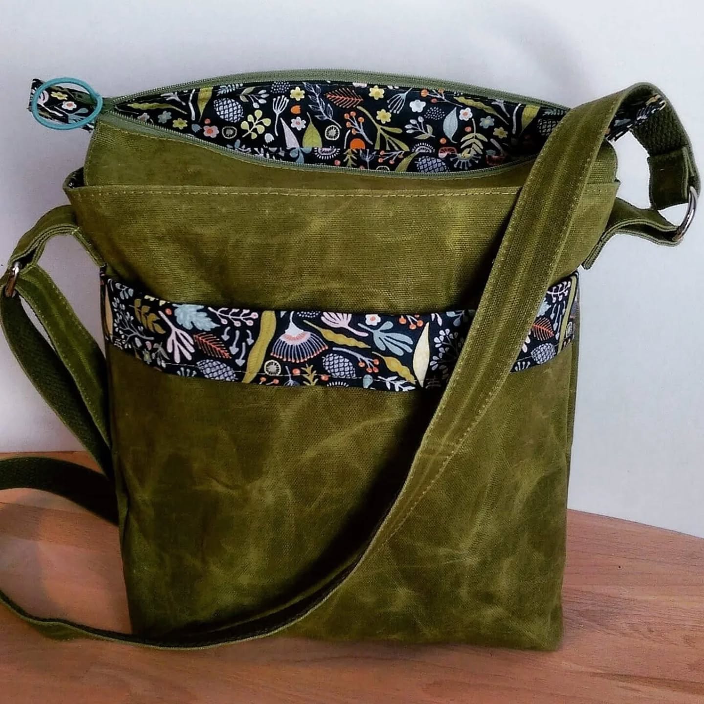 Customer opinion required... read on!
It's been 10 years since I made this bag, and at the time it was my bestseller. I couldn't keep that pretty print fabric in stock! I was living in California at the time and frequenting Jo-Ann's fabric store, always armed with their famous coupons to buy whatever stock they had of it. That lovely green canvas was handmade in Texas and I bought it from a supplier on Etsy. The day that print fabric was ran out was a sad day for sure!
I'm interested what your reaction is to this bag 10 years on. Is it still appealing? Should I revive it and make something similar in my current collection? Does it make a good leather alternative?
Thanks for your input!
#throwback #waxedcanvasbag #joannfabrics #alfrancestextiles #handmadebag #ditsybags #etsyselleruk❤️