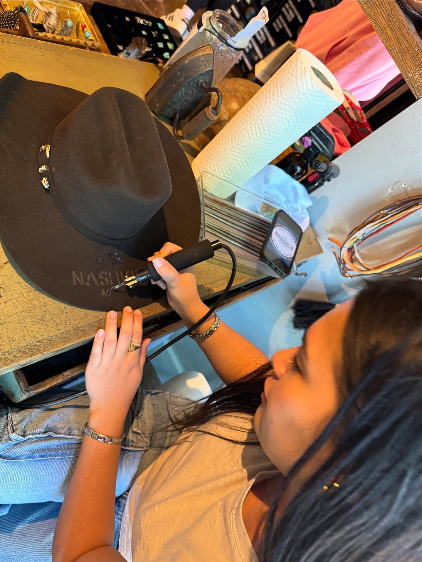 When your hat’s not just bought, it’s born.
Some folks get their names embroidered on shirts.
We get ours burned into felt.
Huge shoutout to the amazing crew at @planetcowboy Cowboy for hand-branding the Nashville Adventures logo right onto this beauty.
It’s not just a hat — it’s a piece of art (and possibly a fire hazard).
#PlanetCowboy #NashvilleAdventures #HandcraftedStyle #CowboyHatCulture #NashvilleStyle #SupportLocal #WesternWear #HatBranding #CustomHats #MadeInNashville #NashvilleBusiness #VeteranOwned #HistoryAintMadeInMuseums #BootsHatsAndStories