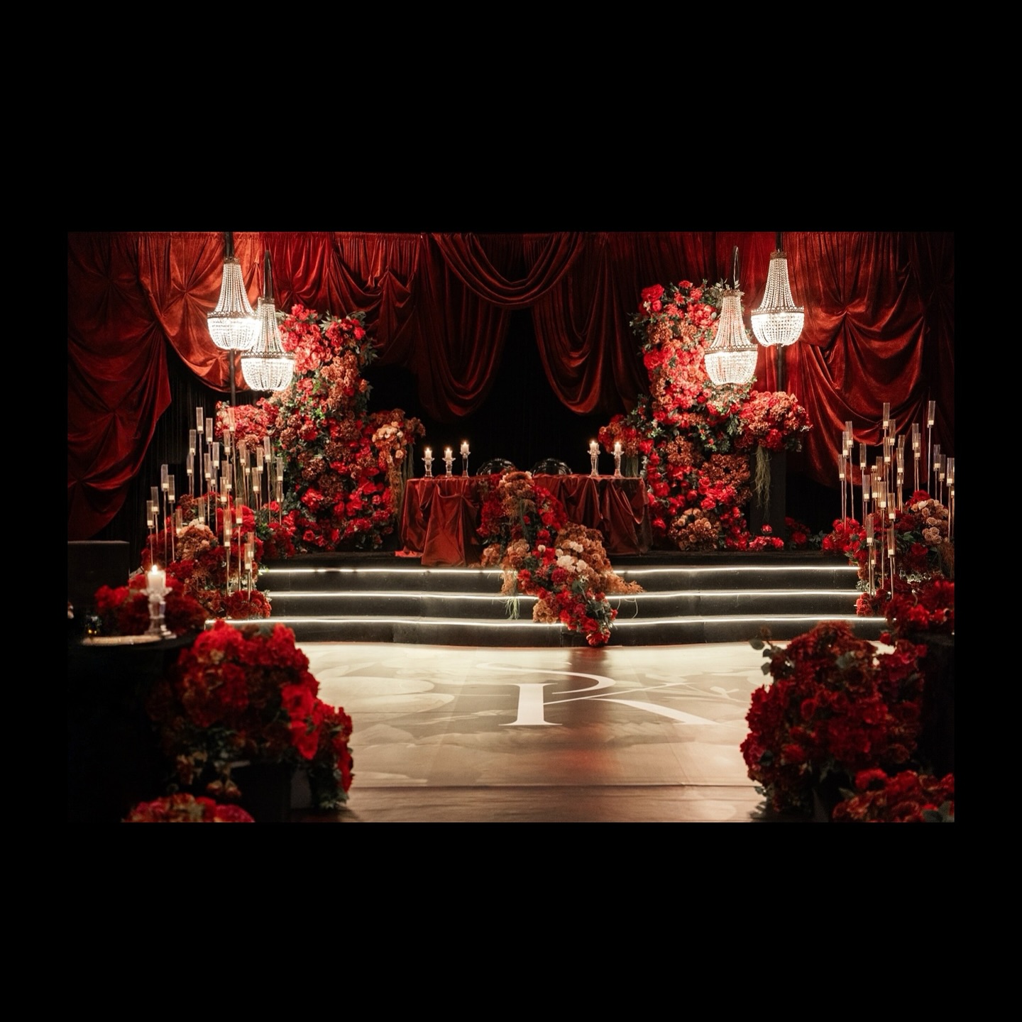 Bathed in Crimson Elegance where candlelight, velvet drapes, and cascades of dark red blooms create a scene of pure romance and grandeur
Design, Decor & Florals @universaldecor
Venue @ariaconventioncentre
Our stunning couple @kparmarr @ sim
#WeddingReception #WeddingDecor #ReceptionDecor #LuxuryWeddingDecor #WeddingInspiration #WeddingDesign #WeddingStyling #WeddingDetails #WeddingVibes #eventdécor