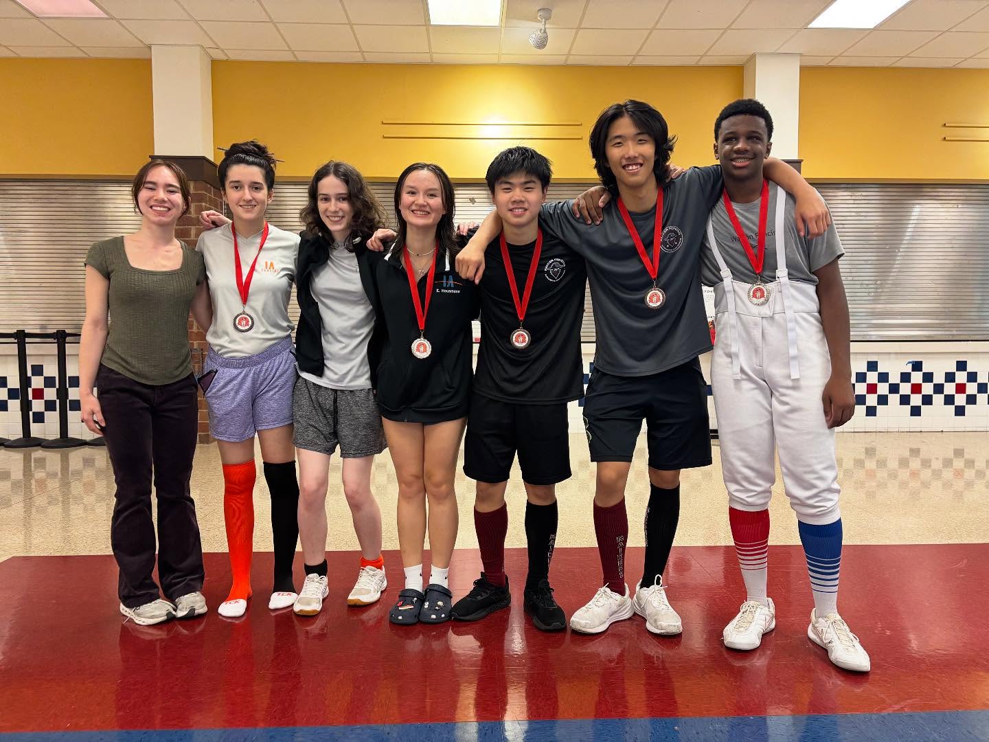 At Round 2 of the Georgia High School Fencing League held last weekend at Pope and Walton High Schools, OFC fencers once again dominated the podium—winning 11 out of the 16 total medals and earned 30 out of the 64 total points awarded.
Following our success in Round 1, this performance once again proves that we are the strongest club in Georgia. Congratulations to all!
G O L D🥇Elinda Liu
S I L V E R🥈Emma Housmans
S I L V E R🥈Lauren Kim
S I L V E R🥈Hubert Nguyen
S I L V E R🥈Teddy Poyotte
B R O N Z E🥉Laila Dandridge
B R O N Z E🥉Arianna Huff
B R O N Z E🥉Christopher Lee
B R O N Z E🥉Alexander Davidenko
B R O N Z E🥉Aidan Hwang
B R O N Z E🥉Winston Lee
5th - Sarah Kim
5th - Abigail Huff
5th - Arisu Jeong
6th - Mallika Desai
6th - Emma Xue
8th - Lucy Noe
9th - Arielle Ligon
9th - Sean Lee
9th - Adam Choi
10th - Emily Cheng
11th - Dhatri Tatikonda
12th - Rahul Menon
12th - Andrew Adcock
13th - Daksh Reddy
13th - Noah Sigg
14th - Eugene Jeong
15th - Octavius Szeto
16th - Arnav Taneja
“OFC LEAGUE”