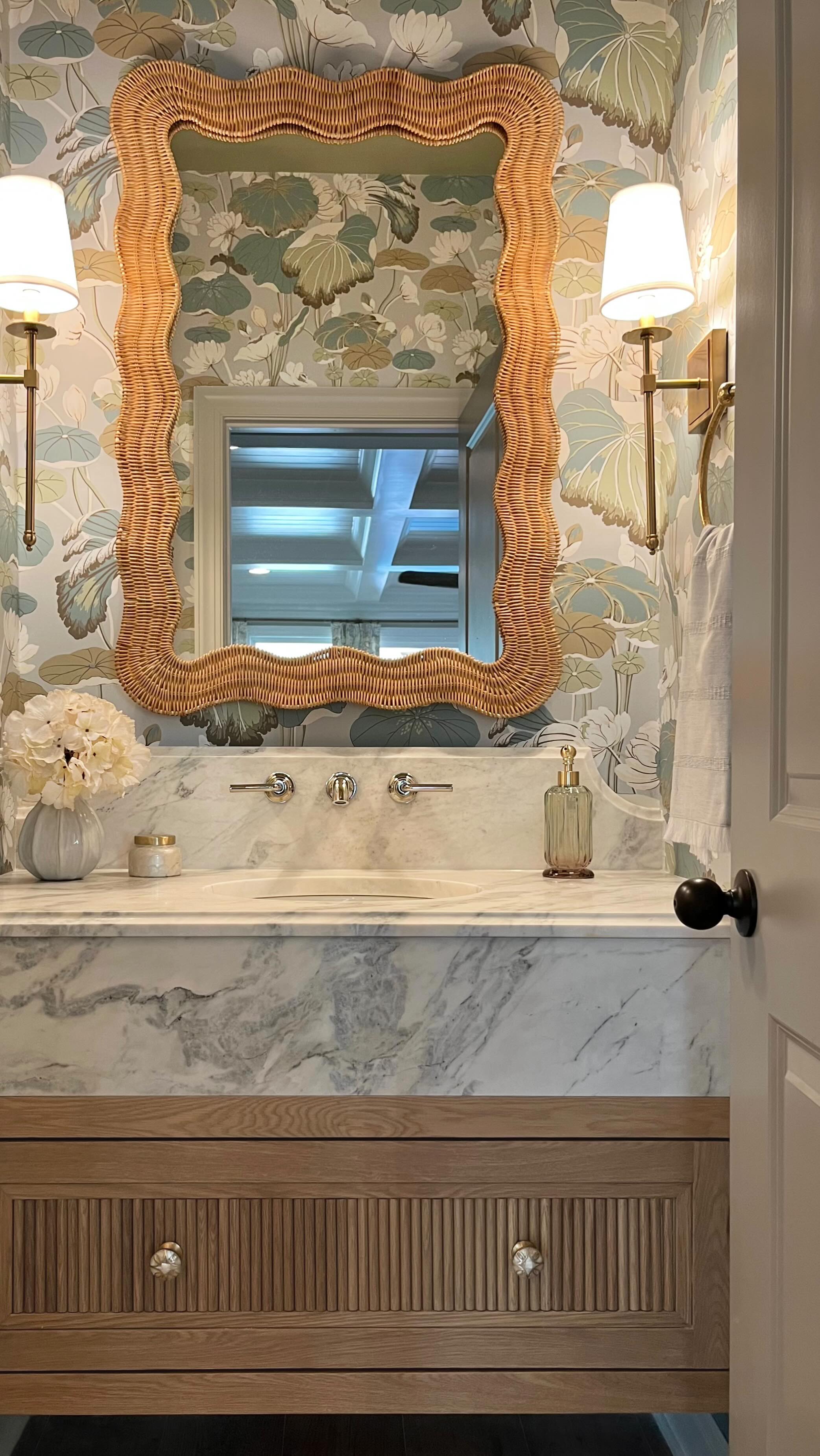 Absolutely head over heels with every single design detail that went into transforming this stunning powder bath. From the lotus wallpaper, to the scalloped rattan mirror, to the mother of pearl & brass knobs, to the custom white oak fluted, floating vanity: I could go on for days 🥹
Big thank you to @theprimelifegroup for nailing it as always! And to Margie, the best wallpaper hanger on earth, who doesn’t do socials 😉 AND to the client for placing trust in us to bring this design to life! Could not have achieved this without you all 🫶🏽
#wallpaper #bathroomtransformation #bathremodel #bathroomdesign #bathroomdecor #designlovers #wallpaperlove #inlovewith #designedwithlove #detailobsessed #bathroominterior #bathroomremodel #bathroomrenovation #bathrenovation #bathroomreno #bathroomgoals #powderbath #halfbath #designdetails #designdetail #bathroomtransformation #beforeandafter #beforeandafterdesign #interiorstyling #interiorlovers #interiordetails #designlife #interiordecor #interiorinspiration #interiorinspo