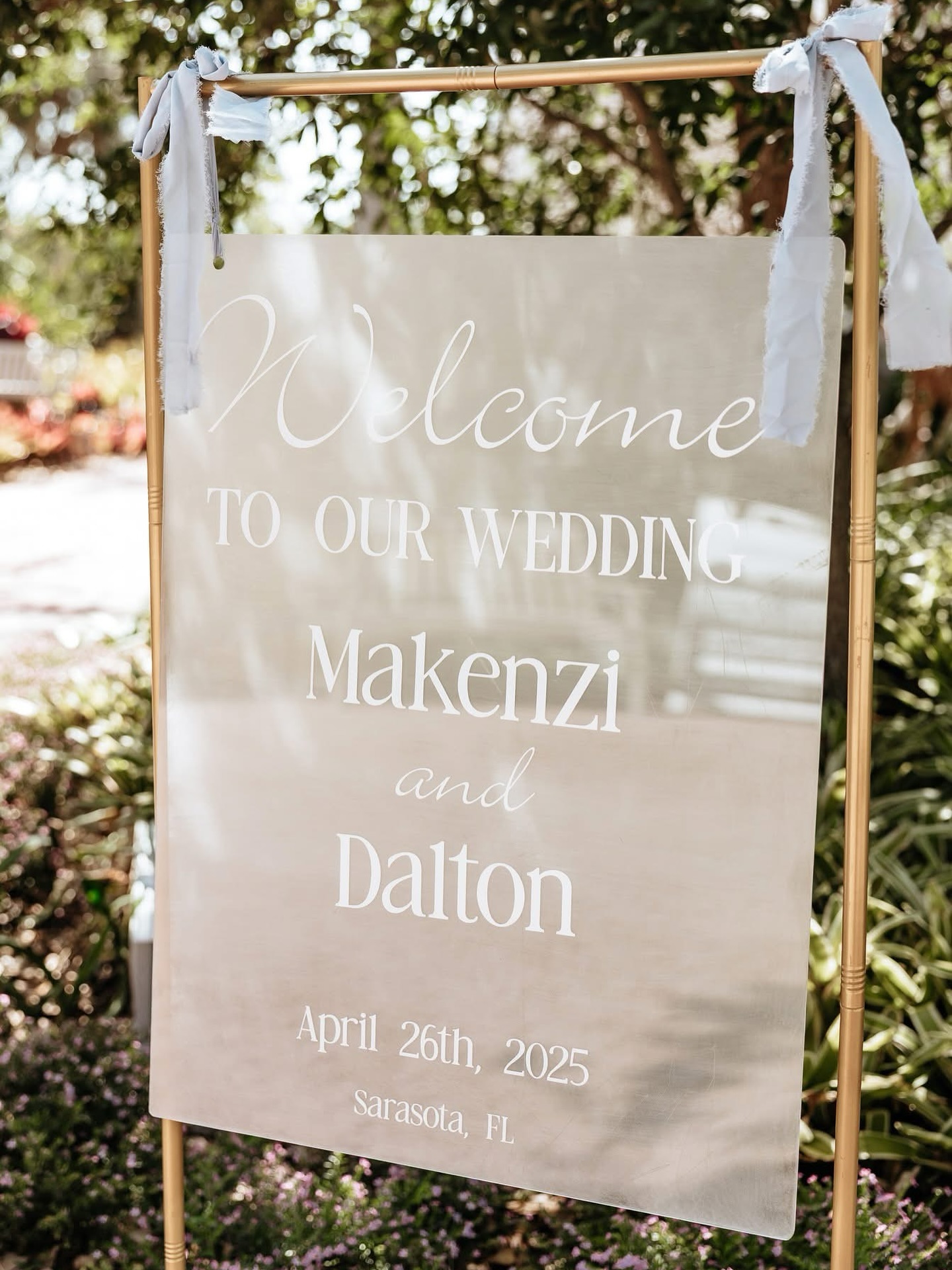 Signage! We got your back👌🏻 custom acrylic sign and stand provided by @bbweddingsevents
.
.
.
.
Venue: @selbygardens
Planner: @bbweddingsevents
Photo: @slphotographyy
Content Creator: @firstlookbysav
Bar & catering: @married.with.michaels
Cake: @publix
Photo Booth Greenery wall: @bbweddingsevents
DJ: @eventsdonerighttampabay
Florals: @onecoflorist
Makeup: @dolledupbrides
Lighting: @affairs_in_the_air
Dress: @thewhiteclosetbridal
Maids: @azaziebridal
Suits: @ looking good suits
Couple @kenzarnld @daltonkarnold
.
.
.
#bbweddings #weddings #sarasota #sarasotaweddingplanner #selbygardens #sashibaez #selbygardenswedding