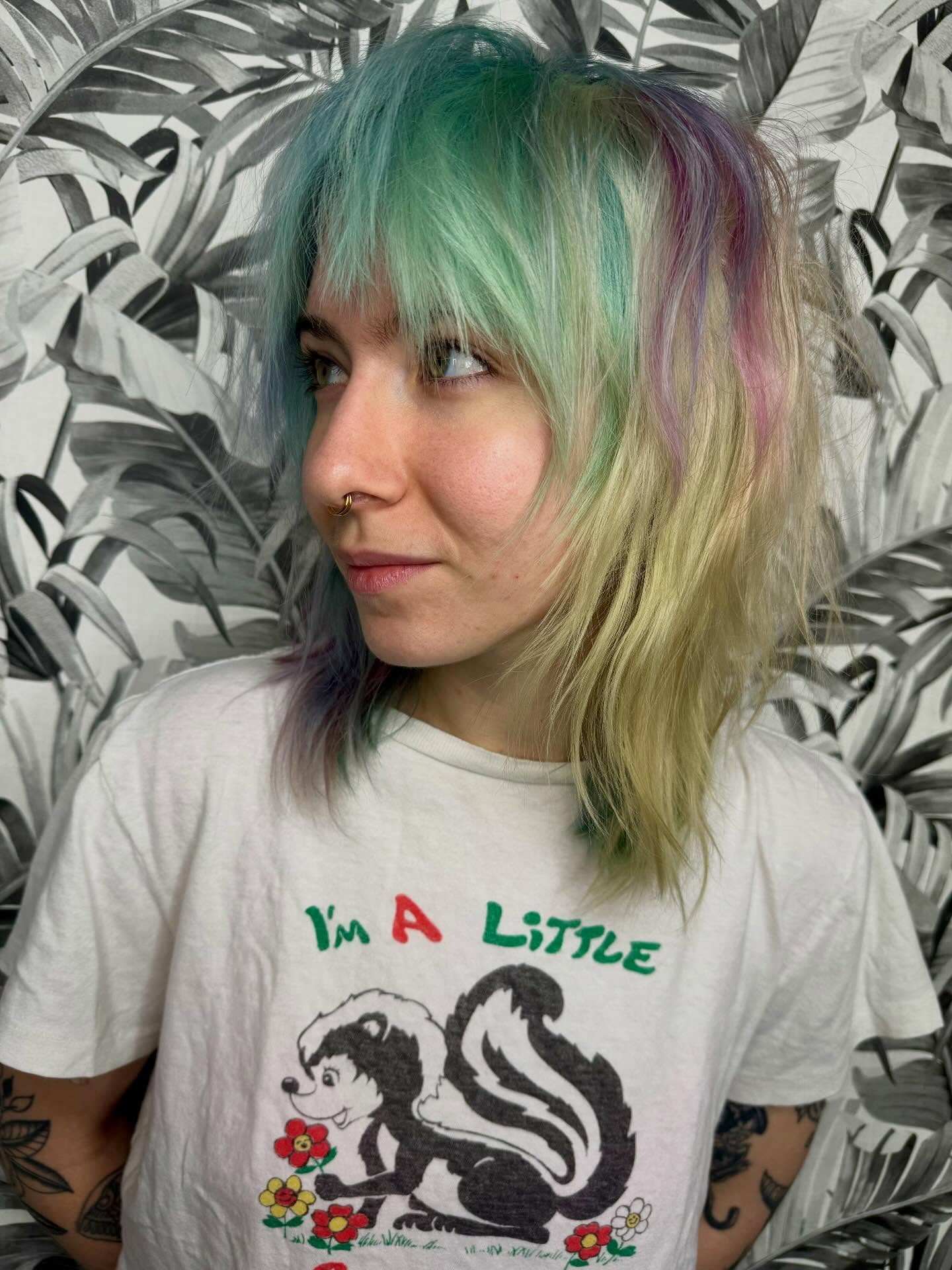 EMPLOYEE SPOTLIGHT
✨SAM✨
Hi I’m Sam! (she/they)
I started at station8 as an assistant almost 2 years ago, and have been taking clients for almost a year now!
I taught myself how to braid when i was 6, started dyeing my own hair when i was 11 (started with blue, naturally), and have always just loved to play with hair. I love working with my hands, and i love a hands-on challenge, so my job is never boring! I love to learn and use every day as a learning experience.
I live with my partner Graham and our two crazy and cuddly orange cats, Otie and Louie, who are 2.5 year old brothers. I’m a big introvert, and I love spending time at home to craft, crochet, do a puzzle, or play scrabble. I also love to thrift shop and have a pretty sweet uranium glass collection 🤩
Being neurodivergent is a *huge* part of my life, so I couldn’t be more grateful to be at a safe space like Station8. I feel not only accepted to be who i am, but celebrated, and always supported. One of my main goals, besides giving you awesome hair, is to provide that same welcoming and comfortable environment in my chair!