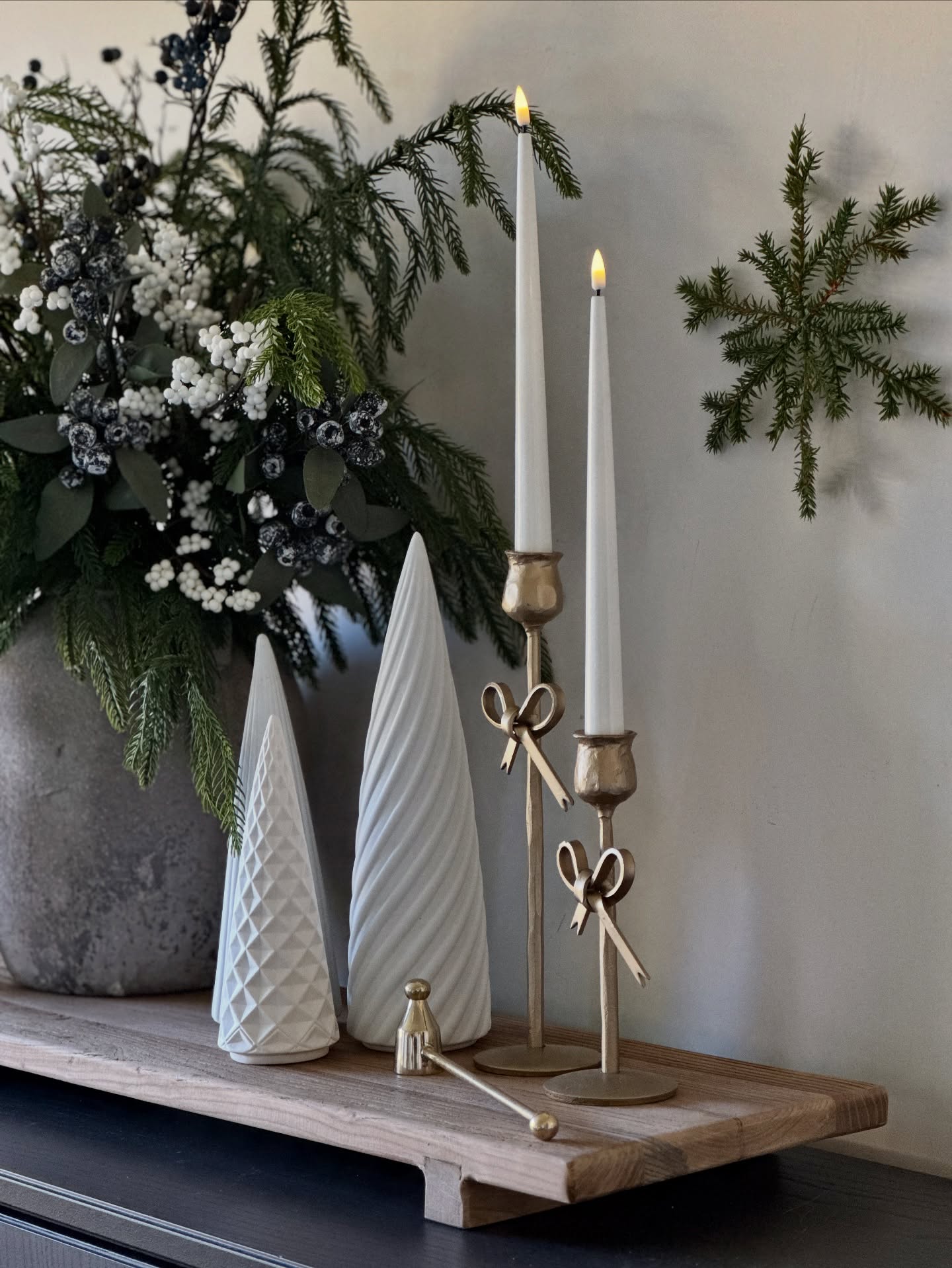 A glimpse into our Christmas Collection. Showcased here is our Faux Winter Berry Bouquet in our Earthenware grey distressed vase, styled alongside our flameless LED tapered dinner candles, crisp white ceramic trees that pop beautifully against the festive greenery, and our Luxury Gold Brass Candle Snuffer. The Hanging Pine Decoration adds a touch of understated charm, perfect for styling on artwork corners, draping from garlands, adorning your tree, or simply hanging on the wall as we’ve done here. All beautifully arranged upon our rustic Elm Board.
Shop the Christmas Collection now before it’s gone, as many lines are already selling out this year.
#BoxwoodHomeInteriors #ChristmasCollection #FauxWinterBerryBouquet #FestiveStyling #ChristmasDecor #HomeDecor #HolidayStyling #LuxuryHomeDecor #ElegantInteriors #RusticElegance #InteriorDesign #SeasonalDecor #WinterDecor #HomeInspo #DecorInspo #ChristmasVibes #HomeAccessories #TimelessInteriors #StylingInspiration #ChristmasHome #ModernClassicDecor #NeutralHomeDecor #InteriorStyling #TabletopDecor #christmasinspo