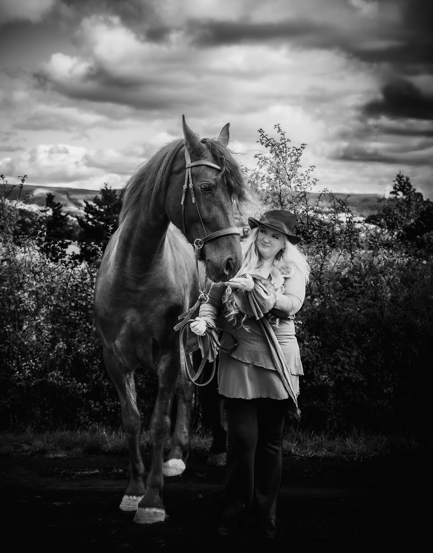 There’s something timeless about a black horse — strength, grace, and that quiet flicker of wild freedom.
This is Kassi, a beautiful Friesian, photographed with her humans, Pete and Tracie.
“I hope you will grow up gentle and good, and never learn bad ways; do your work with a good will, lift your feet up well when you trot, and never bite or kick even in play.” — Black Beauty 🖤🐴
Hashtags:
#BlackBeauty #FriesianHorse #HorsePhotography #EquestrianPhotography #HorseAndHuman #EquinePortrait #FriesianLove #BlackHorse #MogwaiMedia #DocumentaryPhotography #StorytellingPhotography #CinematicPhotography #NaturalPortraits #MidWalesPhotographer #WelshPhotographer #HorseLovers #EquestrianLife #HorsePortraits #EquineArt #LightAndMovement