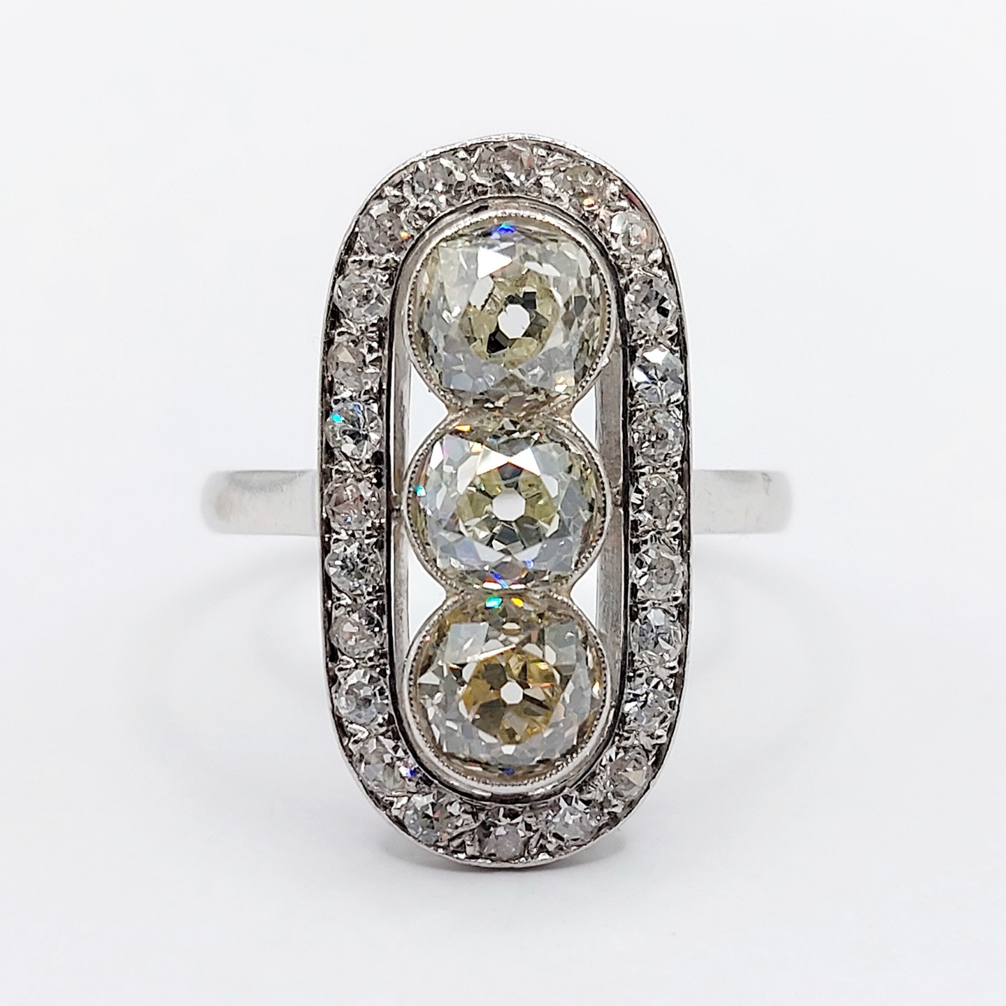 French Art Deco marquise ring Platinum set with 2.25 carats of old mine cut diamonds surounded by 0.70 carats of round diamonds (circa 1910)
PRICE : 5200€
Magnificent and rare French Art Deco goldsmith work
Size: 54.5 FR / 7 US
Weight: 5.69 gr
Main diamond size (x3): approximately 5.9 mm (estimated at 2.25 carats in total)
Diamonds in perfect condition (one diamond has a micro-scratch due to an inclusion), a few small inclusions visible only under a magnifying glass
Slightly yellow color
Secondary diamond size (x24): approximately 2 mm (estimated at 0.70 carats in total)
Head size : 21.6 x 11.2 mm
Micro-scratches from use
Dog's head hallmark and Master Goldsmith's hallmark (French Hallmarks)
#frenchjewelry #diamond #diamondring #antiquering #victorian #victorianring #marquisering #augustusjewels #vintagering #daisyring #daimondhaloring #tragetring #oldminecut #oldminecutdiamond