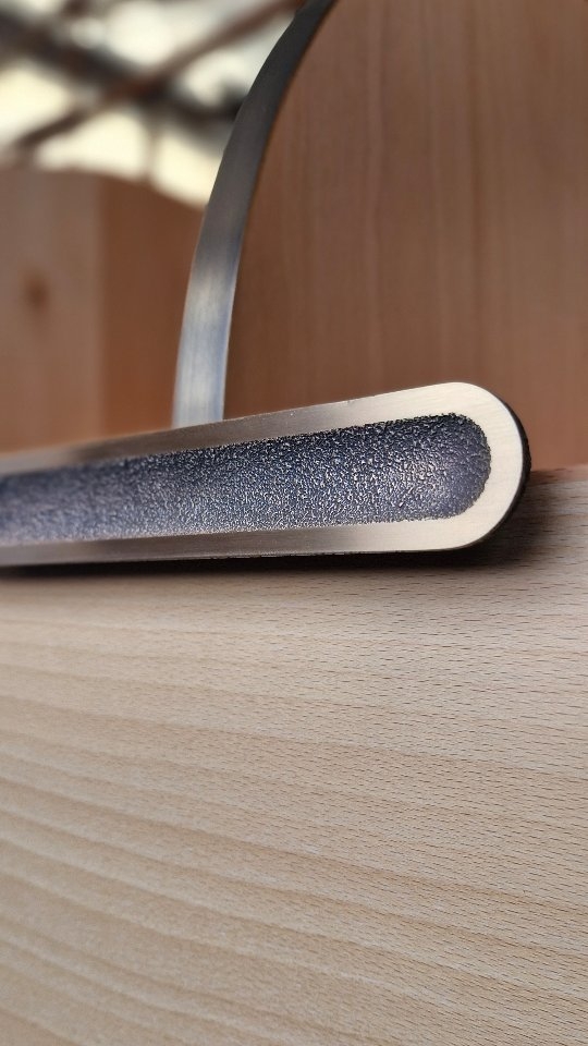 Custom sandcast handle in bronze.