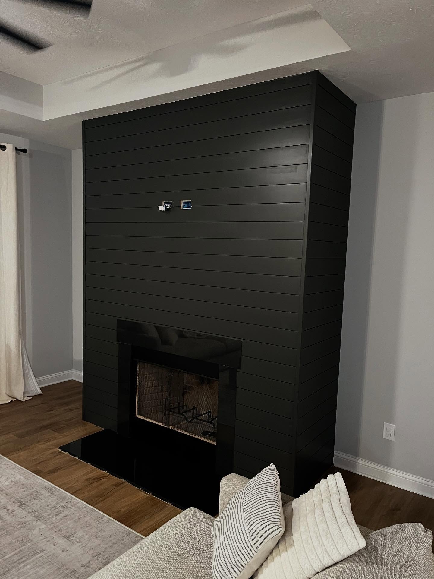 Elevating the living room with some shiplap and “iron ore” black by Sherman Williams! #paintitblack #freshstart #handyman #shiplap