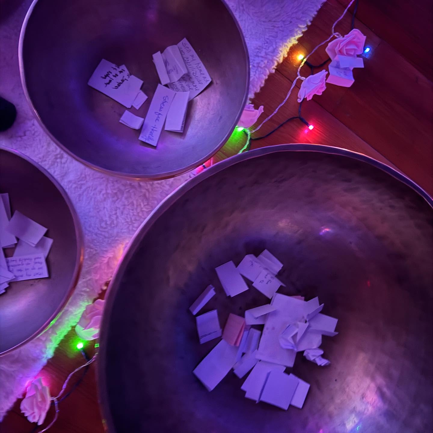 Every now and then…..people ask me about all the little papers inside my bowls. Those small pieces of paper are people’s prayers, wishes, and intentions that have been written over the years! Some of them have been sitting in these bowls since I first opened the studio four years ago. I never read them, but every time I play….at every sound bath……I pray that God places His hand over every single one of those intentions!
On some of my crystal bowls you’ll also see words written on them……scriptures, prayers, and words that inspire me. When I play, I’m not just making music. I’m reading scripture, I’m praying, and I’m asking God to bring peace to everyone who walks through those doors.
People come to sound baths for so many reasons. Some are stressed out, some are hurting, some are trying to heal from illness, some just need a moment to breathe. Every session reminds me that this space is not about me……it’s about the people who come here and the little moment of peace they need.
Every time I look at those bowls filled with prayers, I’m truly humbled. We all have something we’re carrying in our hearts, something we’re asking God to help us with. No one is above anyone else! We’re all just trying to do our best, finding our way, and trying to bring a little peace & hope into our days.
This is why I do what I do and I’m grateful !
If you come to the studio…feel free to add your prayer…wish ..or intention…throw it in any bowl in the studio. ☺️