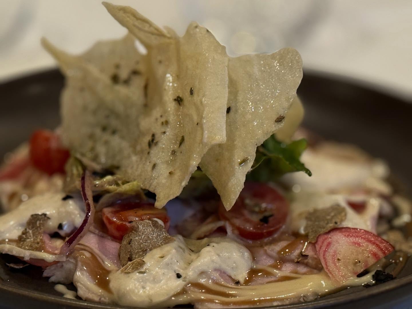 “Indulge in the ultimate Italian luxury! 🍴✨ Our Truffle Vitello Tonnato is a game-changer. Tender veal, creamy tuna sauce, and the intoxicating aroma of truffles... it’s a match made in heaven! 😍 Served with truffled dwarf peaches for a truly unforgettable experience. #trufflevitellotonnato #italianfood #foodie #luxurydining #lizziecucina #madewithlove #michelinguide #timeoutlondon #hiddengems #truffe @northlondonloves