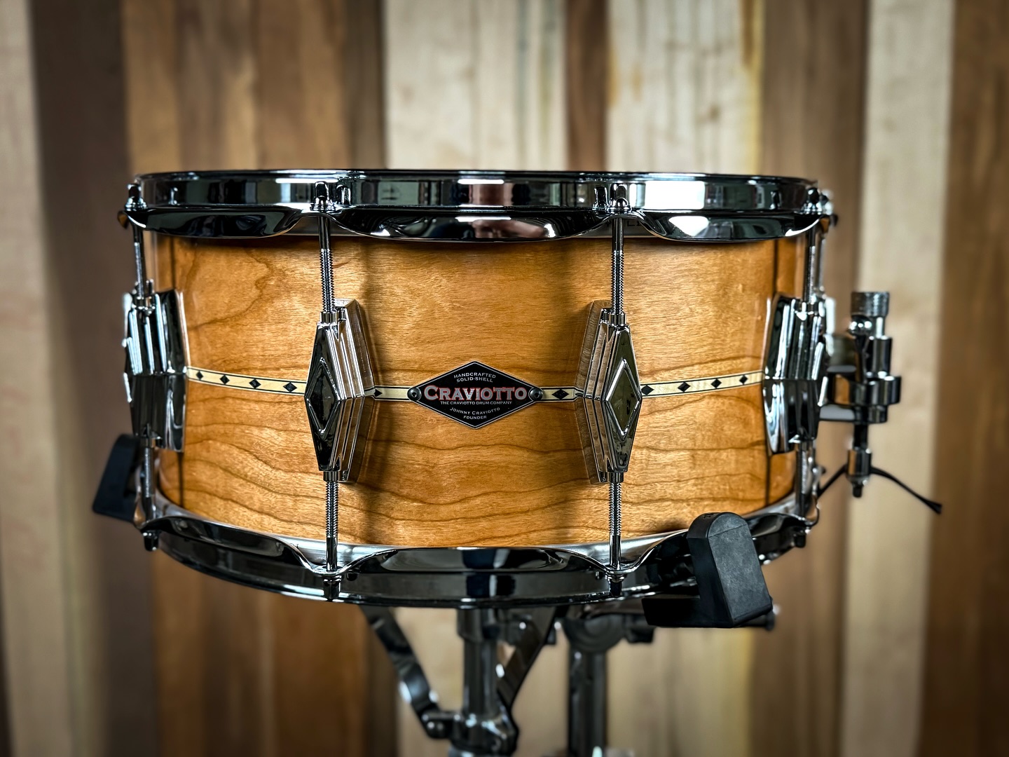 Custom Shop 6.5x14 Cherry with Maple inlay, 45 degree bearing edges, diamond cast lugs, and finished in satin oil.