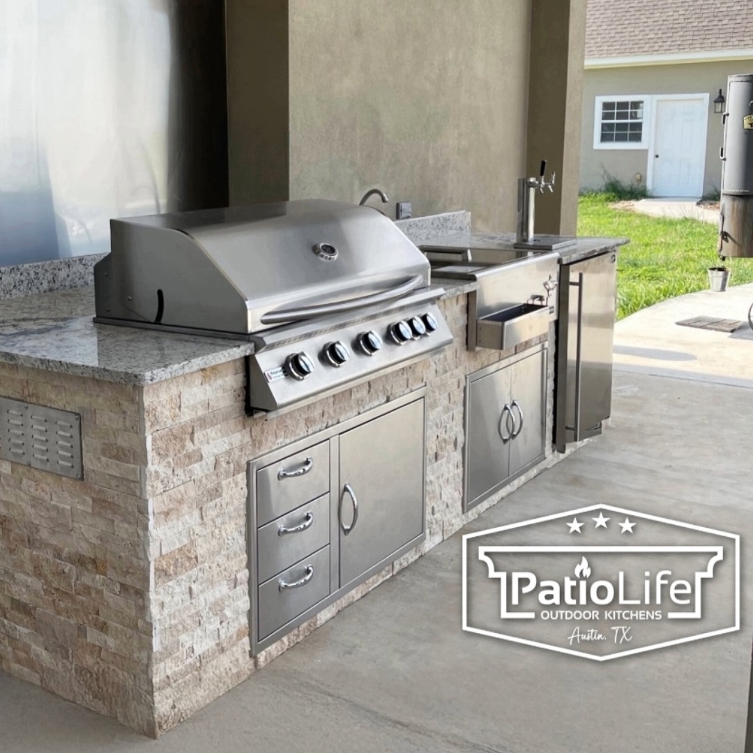 Custom outdoor kitchen, loaded with everything needed to entertain! The kitchen includes an RCS grill, Coyote Refreshment Center sink & ice chest, a kegerator, granite countertops, stainless steel backsplash, and MSI - Roman Beige exterior stacked stone.
#DesignedwithMSI
#outdoorkitchen
#PatioLife
#patiogoals
#bbqisland
#austinhomes